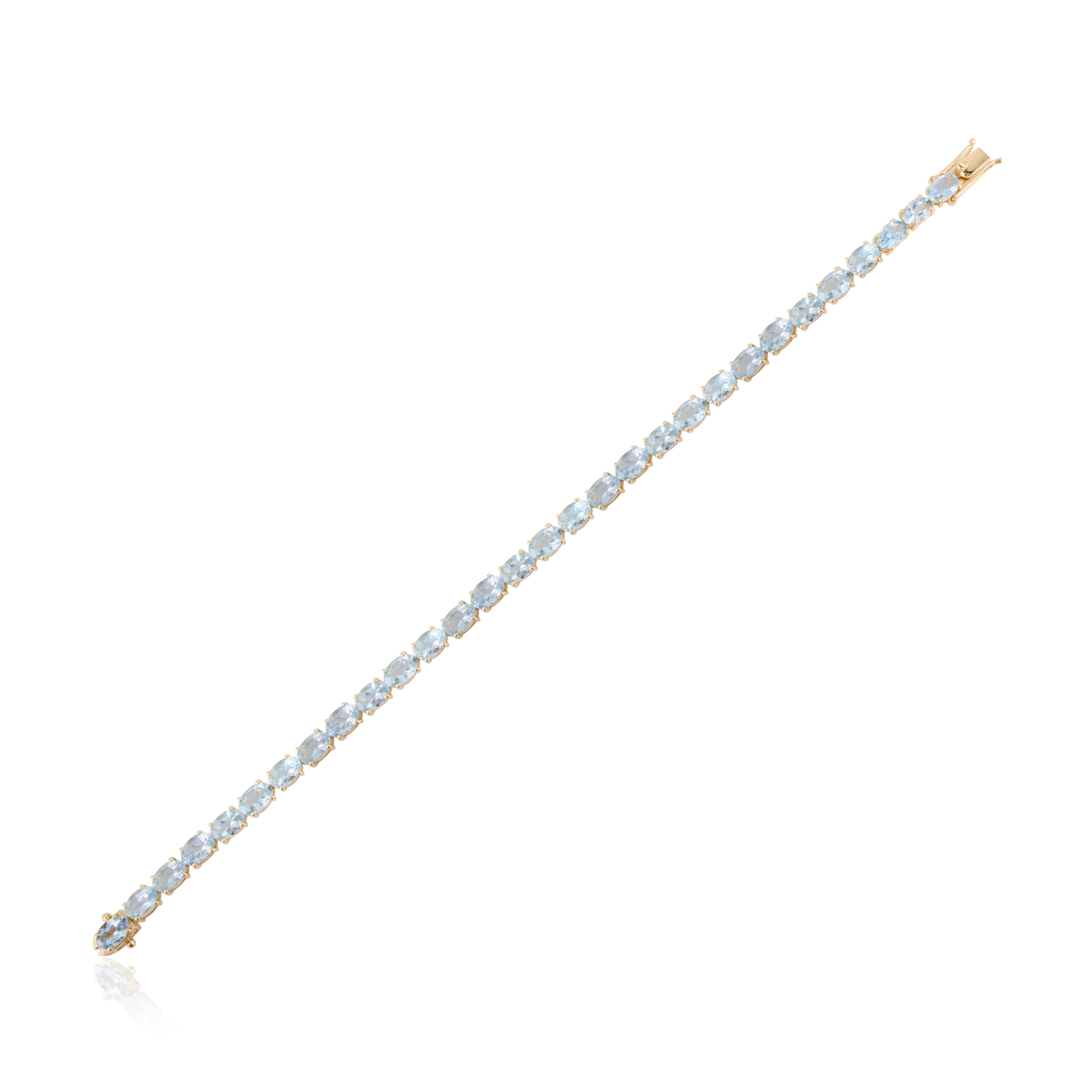 Moderniste Bracelet tennis en or jaune massif 18 carats avec aigue-marine taille ovale brillante de 11,57 carats en vente
