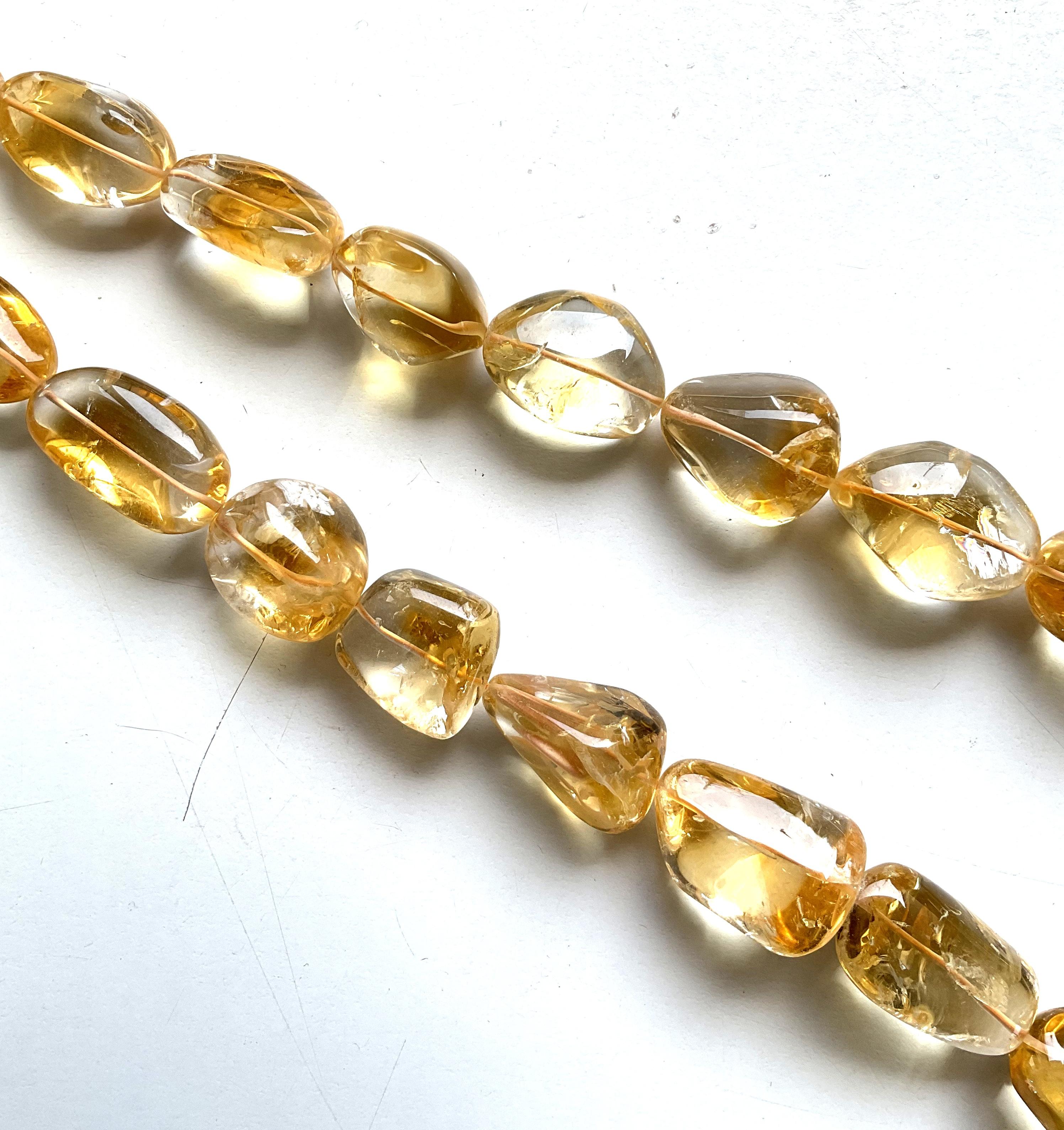 Tumbled 1157.00 carats big size citrine plain tumbled natural gemstone necklace For Sale