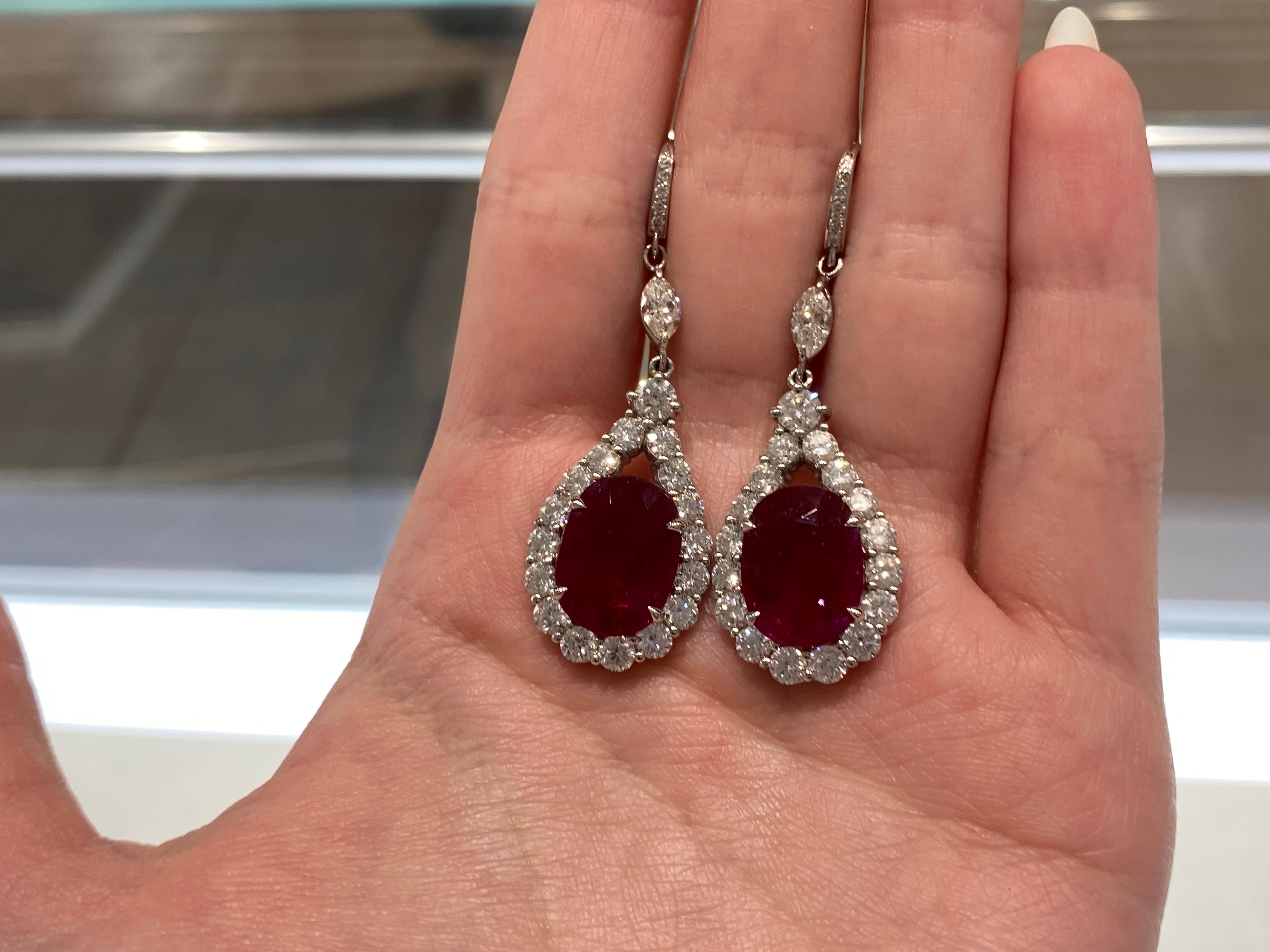 11.58 Carat Oval Cut Rubies with 4.49ctw Diamond Halo Earrings in 18k White Gold In New Condition In Houston, TX