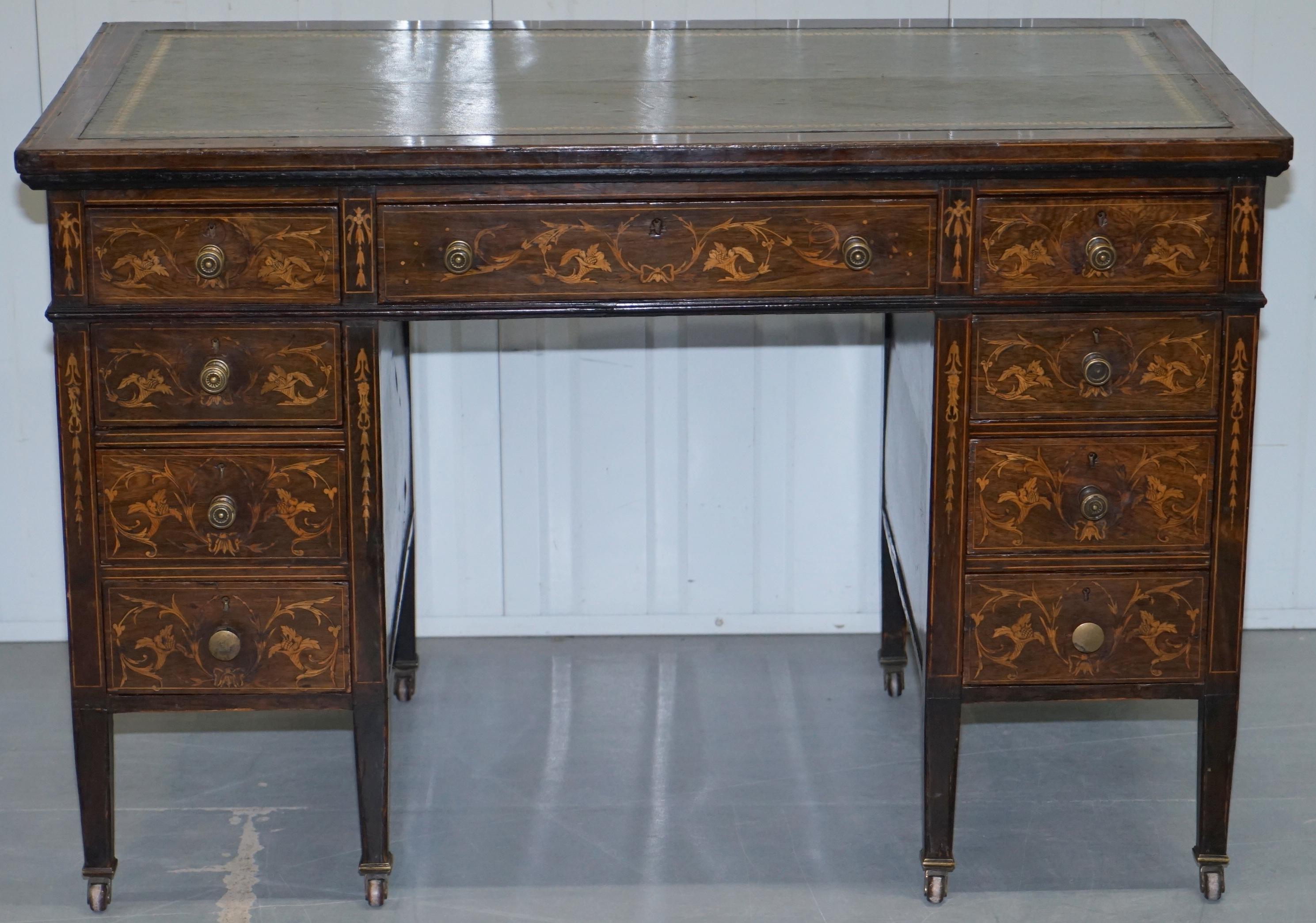We are delighted to offer for sale this rare original Victorian circa 1860 Hardwood  Marquetry inlaid writing desk

A stunning highly decorative desk, this piece must have taken months to make, the Rosewood patina is glorious, its rare to find this