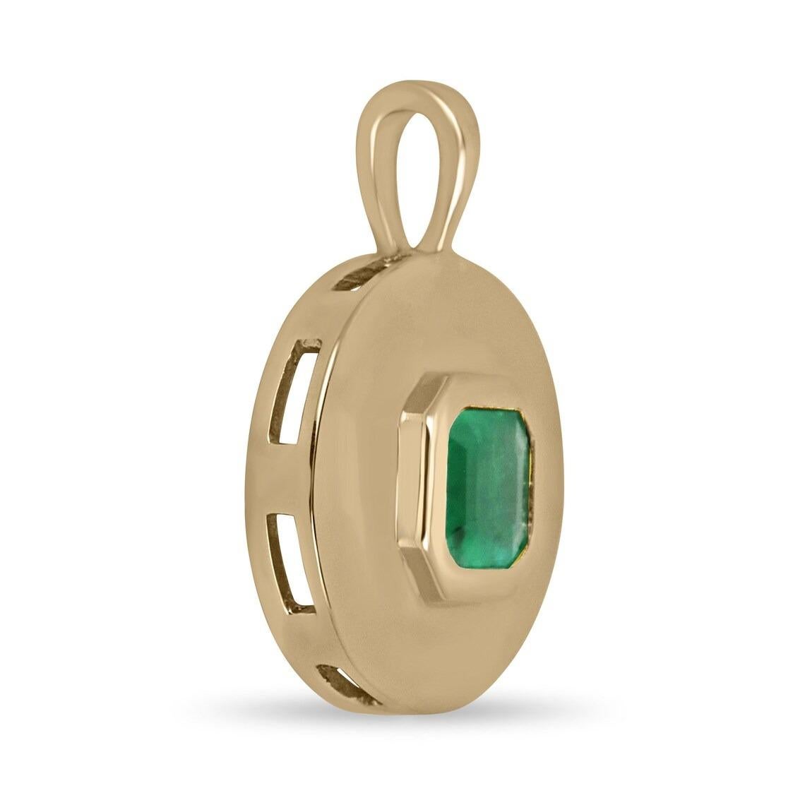 A stunning solitaire emerald pendant. This lovely piece showcases a remarkable natural asscher-cut emerald of the origin of Colombia. The gemstone displays a remarkable vivid medium green color, followed by good clarity and luster. Carefully bezel