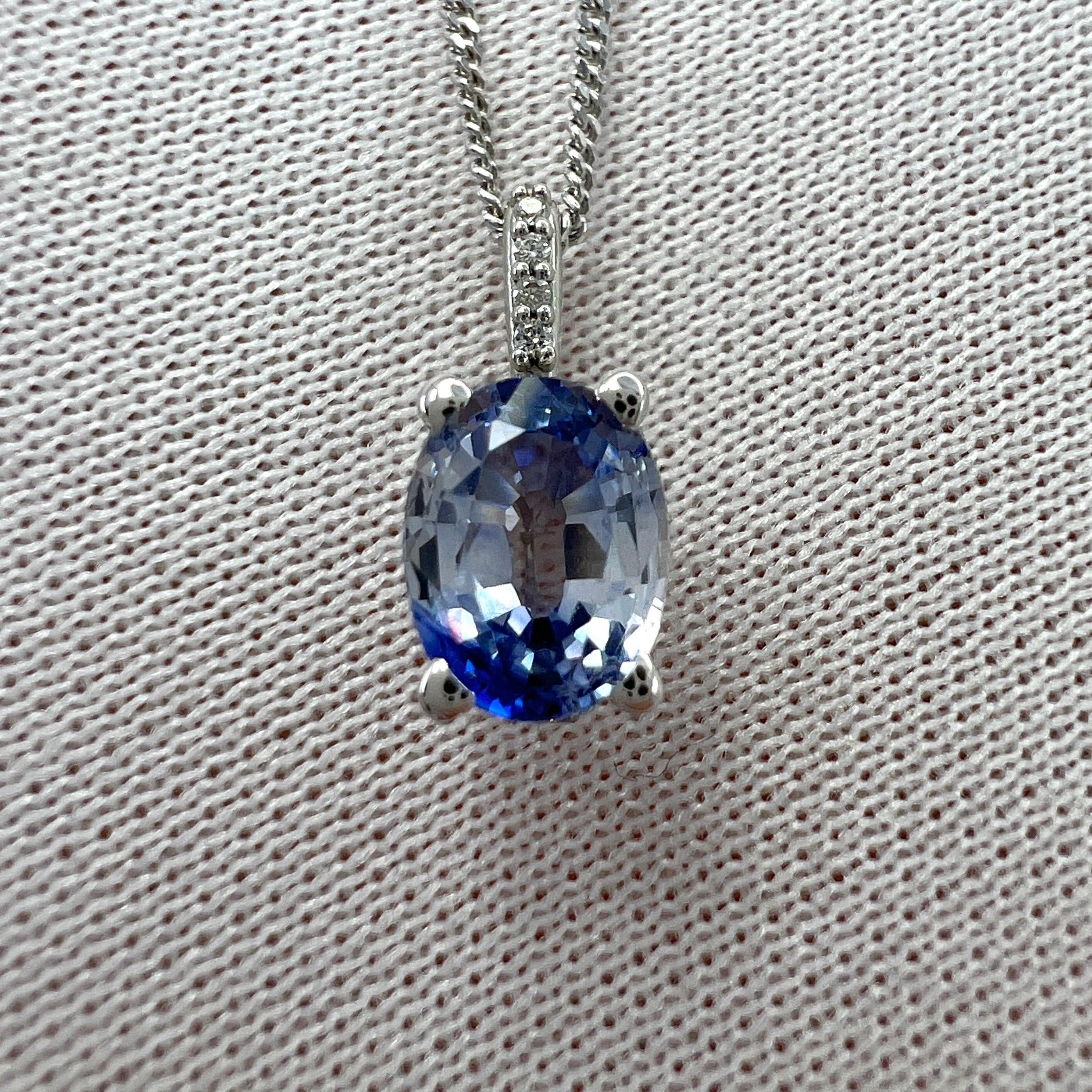 Natural Bi Colour White And Blue Ceylon Sapphire & Diamond 18k White Gold Hidden Halo Pendant Necklace.

1.15 Carat sapphire with a unique white and blue bi colour effect. Rare and stunning to see.
This stone also has excellent clarity. A very clean