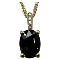 Pendentif en or jaune 18 carats serti de diamants et saphir bleu vert foncé non traité de 1,15 carat