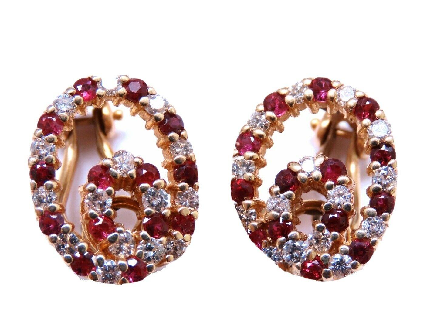 Ruby swirl endless clip earrings.

.65ct natural  rubies, full brilliant cut clean clarity and transparent

.50ct. natural round diamonds h color vs2 clarity.

14 karat white gold 8g

Earrings measure 16 x 13mm