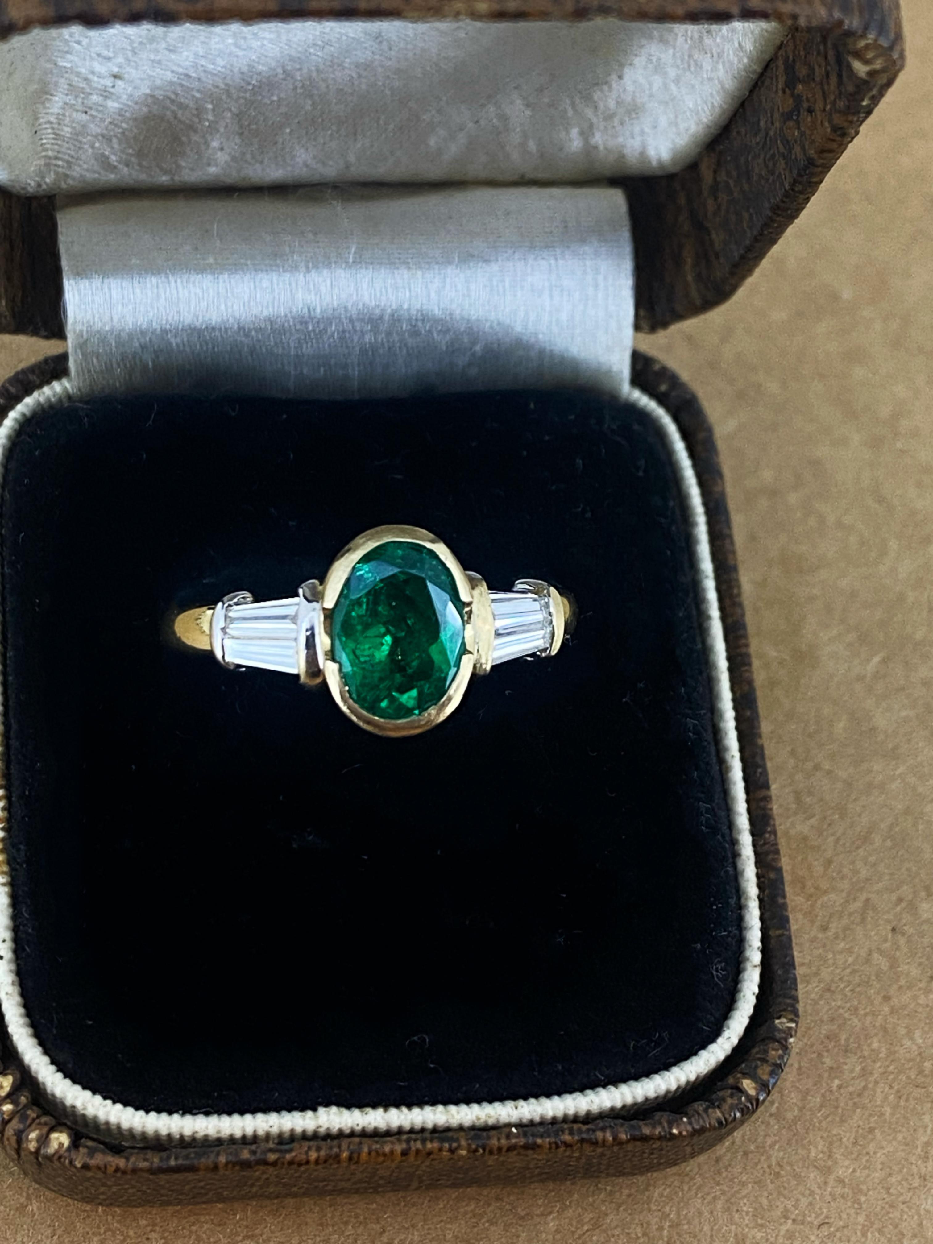 This vintage handmade piece of jewellery 
is featuring a superb Natural Emerald 
of impressive size – 1.15ct (6mm x 8mm)
of Zambian origin & 
the most magnificent vivid intense grass green colour 
(the best colour an emerald could have) & 
very good