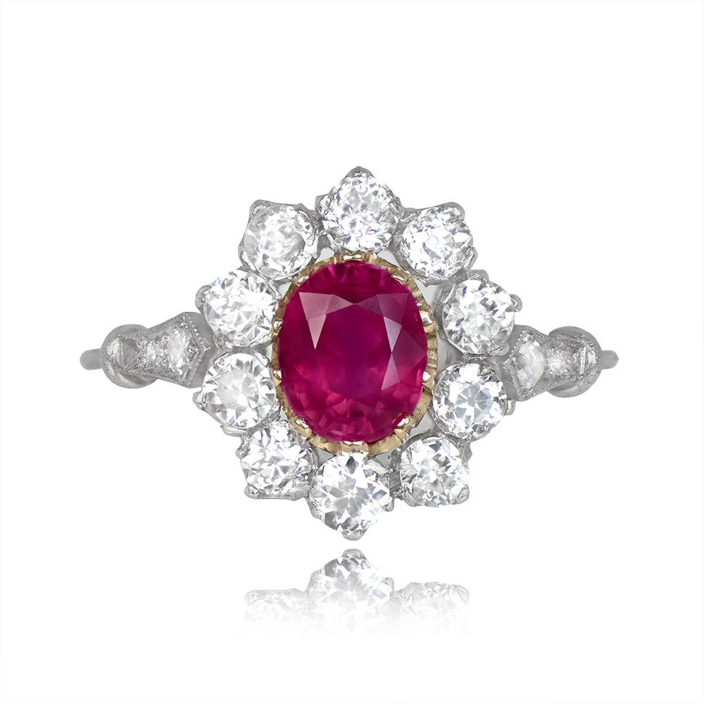 A stunning platinum ring with an oval-cut ruby, approximately 1.15 carats, set in 18k yellow gold prongs. The center ruby is surrounded by a halo of old European cut diamonds, approximately 1.00 carats, set in platinum prongs.


Ring Size: 6.5 US,