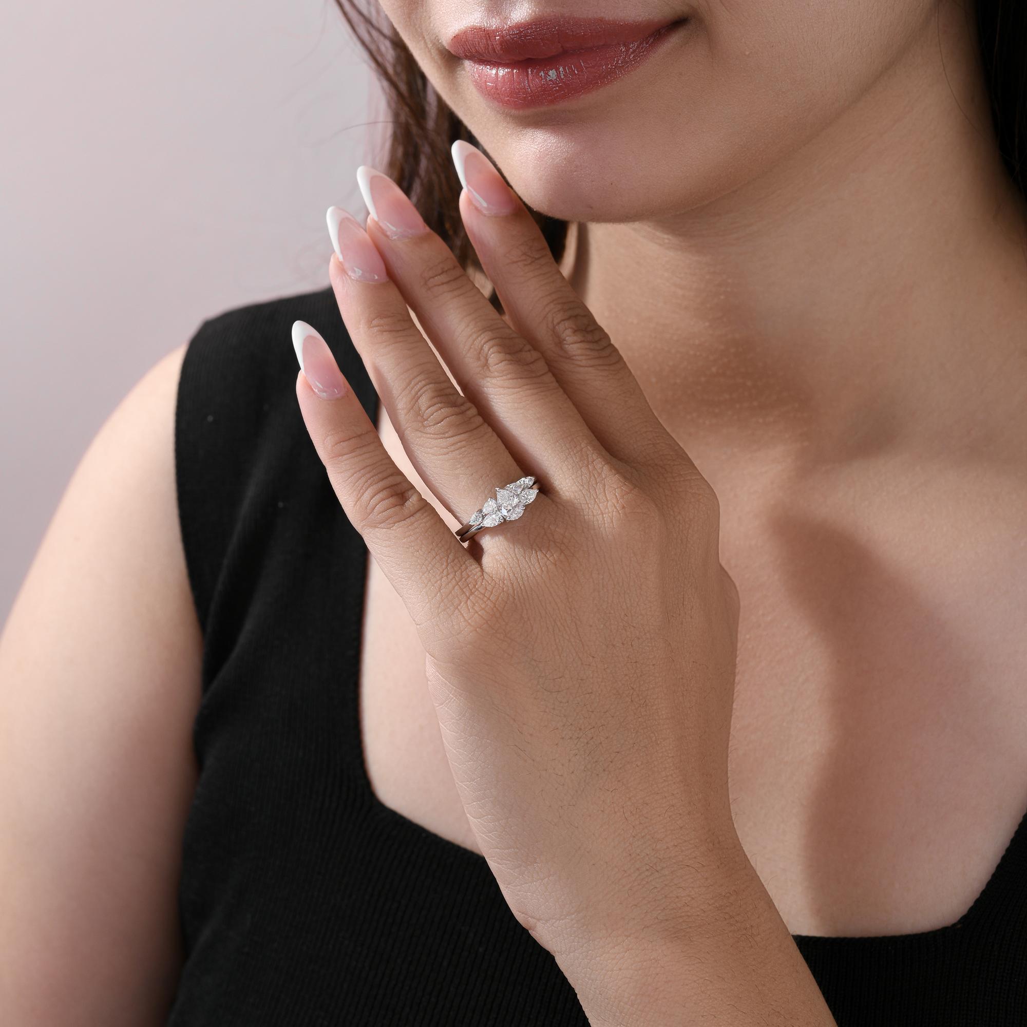 1.15Ct Pear Solitaire Engagement Ring with Matching Pear Band Set 18K White Gold
This ring featuring a brilliant pear-shaped solitaire engagement ring paired with a delicate matching band adorned with pear-cut stones, this set is designed to