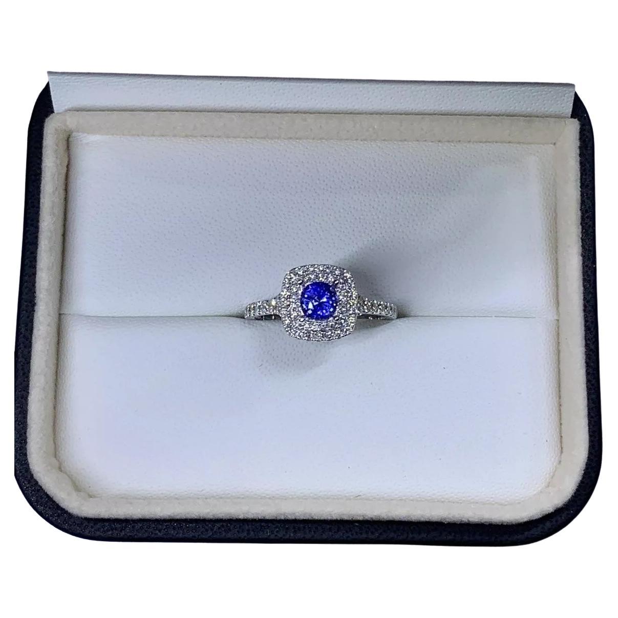 1.15ct Sapphire Diamond Halo Engagement Ring 18ct White Gold.