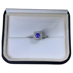 1.15ct Sapphire Diamond Halo Engagement Ring 18ct White Gold.