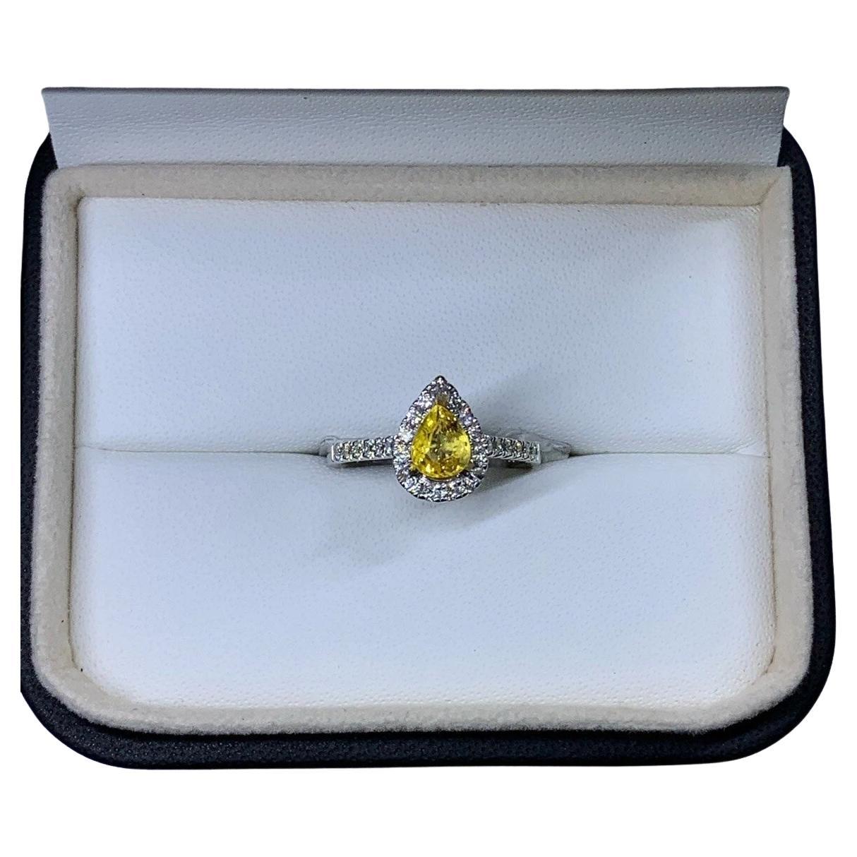 1.15ct Yellow sapphire pear diamond halo engagement ring 18ct white gold.