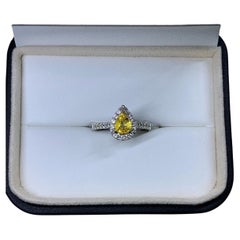 1.15ct Yellow sapphire pear diamond halo engagement ring 18ct white gold.