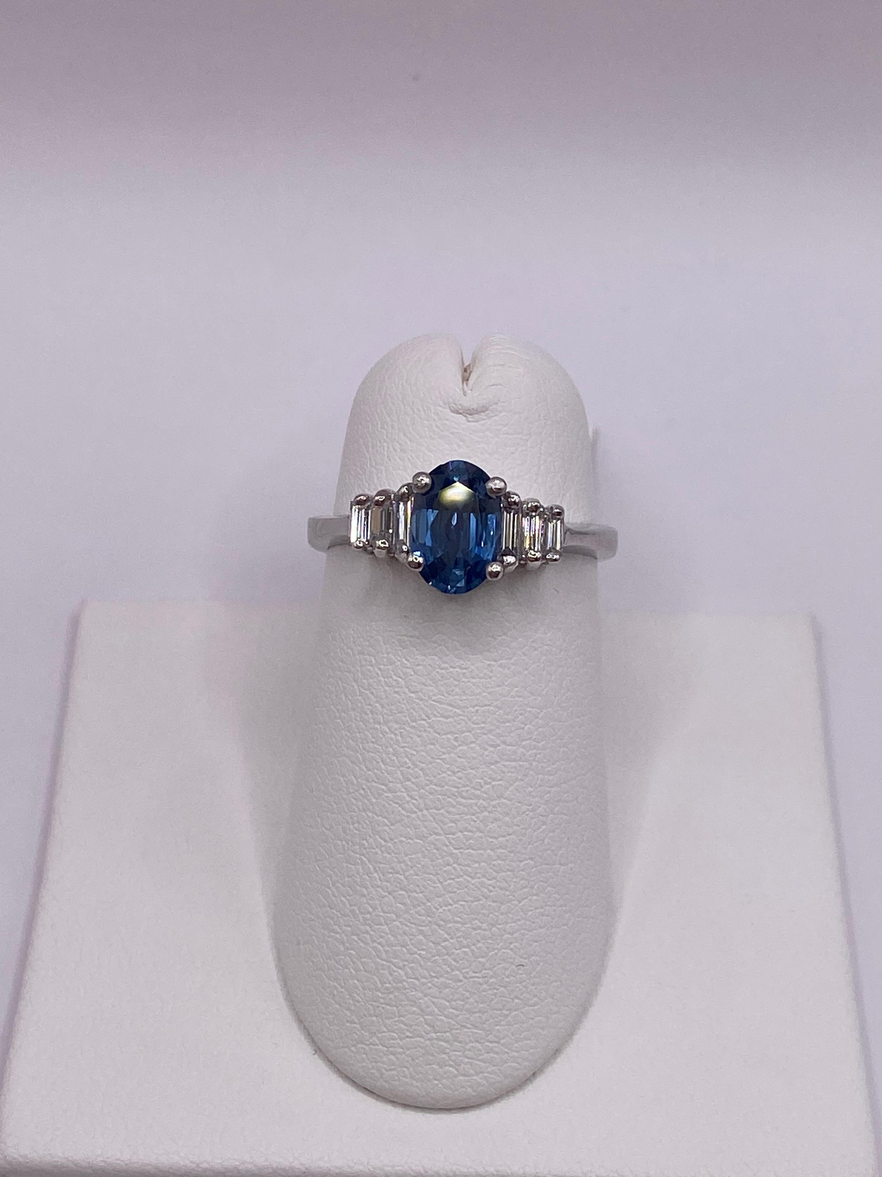 Modern 1.15ctw Oval Sapphire & Baguette Diamond Ring in Platinum For Sale