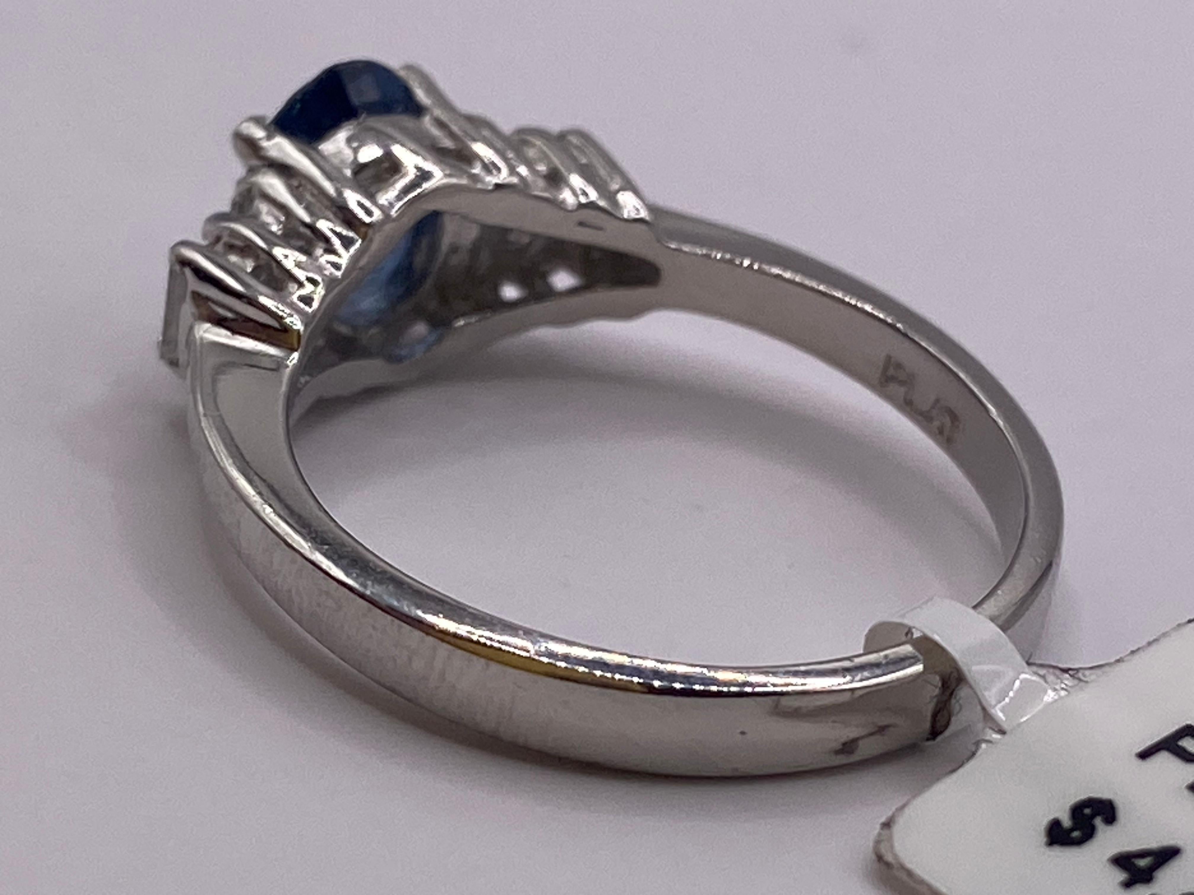 1.15ctw Oval Sapphire & Baguette Diamond Ring in Platinum In New Condition For Sale In New York, NY