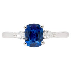 1.16 Carat Blue Sapphire and Diamond Three-Stone Platinum Engagement Ring