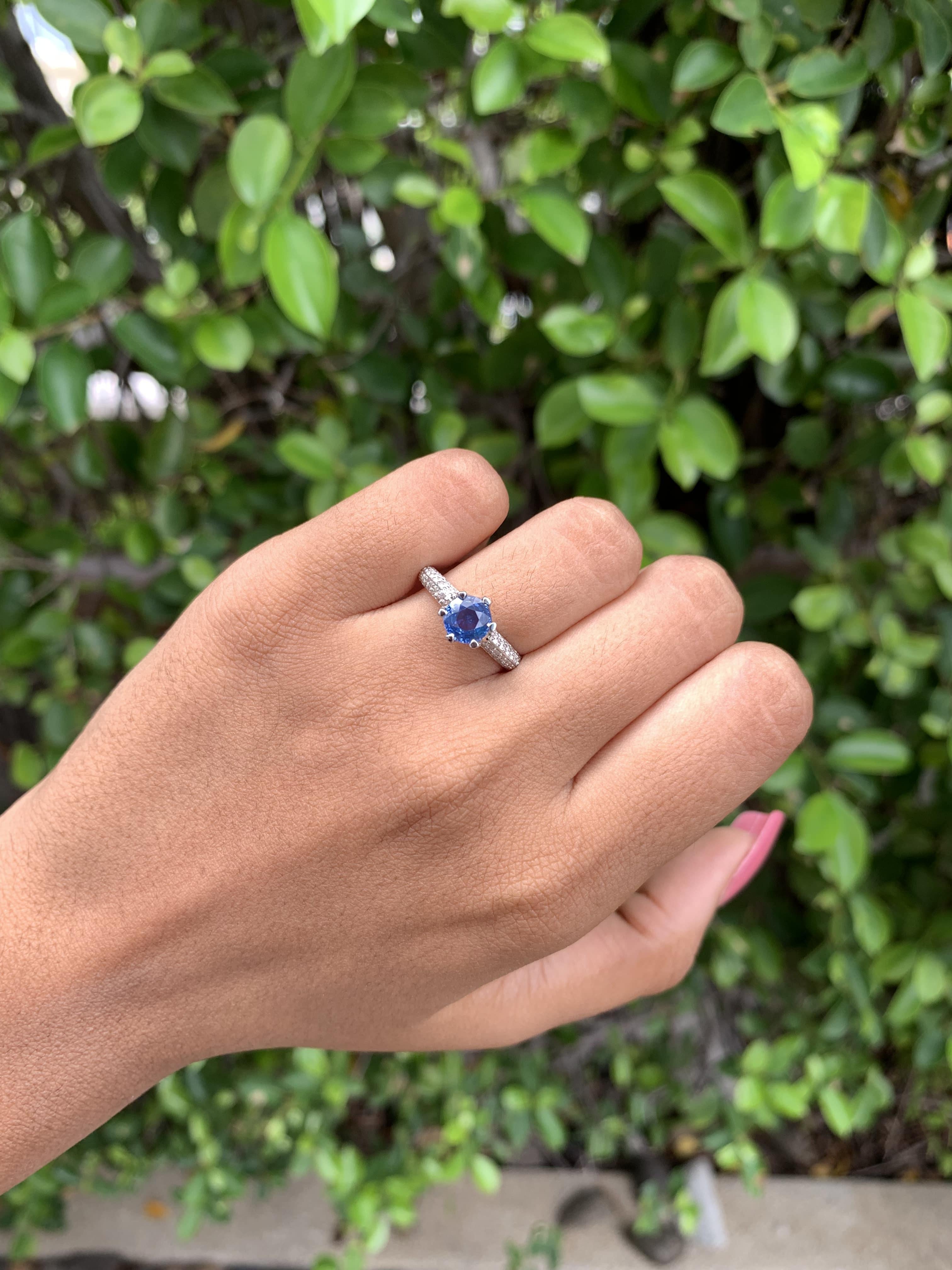 Presenting this enchanting piece of jewellery, 1.16 Carat Sapphire Solitaire Ring. At the heart of this exquisite ring lies a stunning Sapphire, radiating a mesmerizing cornflower blue hue that is sure to captivate hearts. Originating from Sri