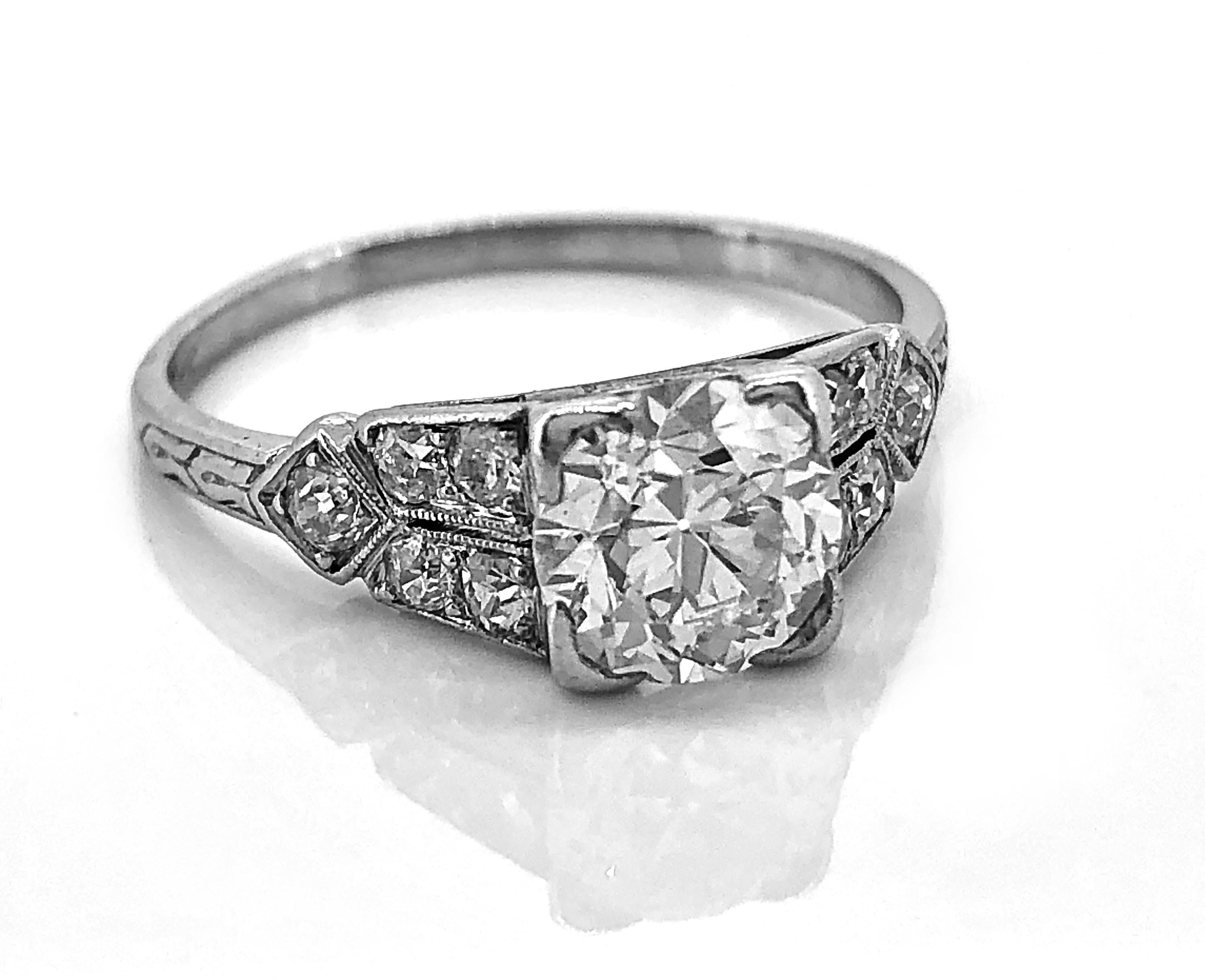 A lovely Art Deco Diamond and Platinum Antique Engagement Ring featuring a 1.16ct. apx. European cut Diamond with SI1 clarity and I color. The accenting .30ct. T.W. apx. diamond melee are set in a split shank style making a lovely and crisp design.