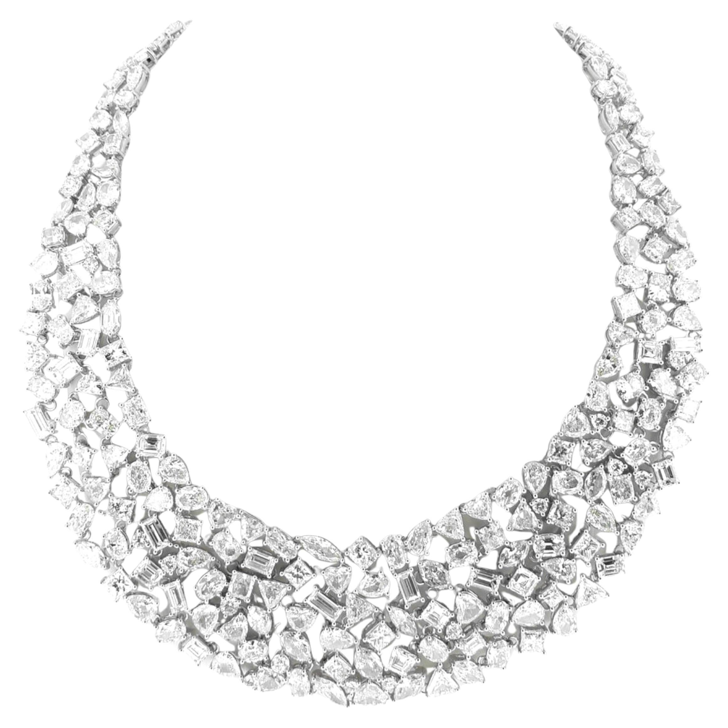Introducing our magnificent Multi-Shape Diamond Necklace, a true masterpiece crafted in 18K white gold. This stunning necklace features an incredible 116 carats of mixed-shape diamonds, expertly arranged to create a dazzling display of brilliance.