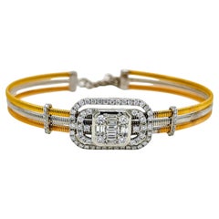 Bangle in oro rosa, giallo e bianco con diamante da 1,16 carati