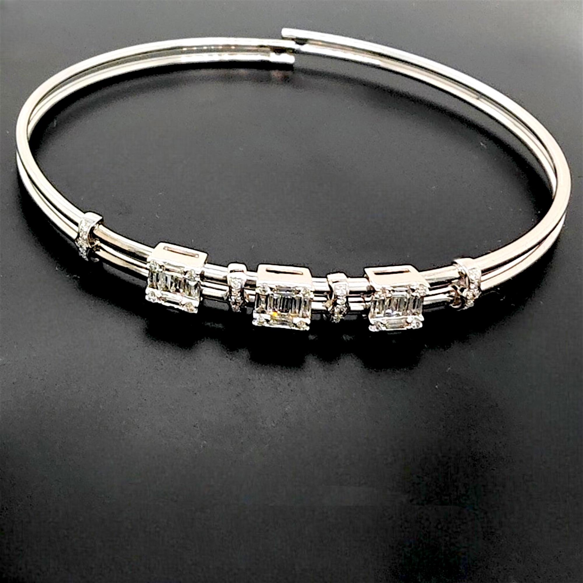 32 diamants blancs ronds : 0.2000 Carats
23 diamants baguettes blancs : 0,44 carats
Métal : or blanc 18 carats, 6,89 grammes
