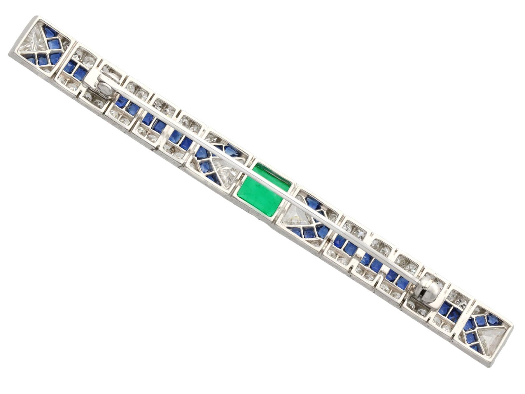 1.16 Carat Emerald 1.90 Carat Sapphire and 3.06 Carat Diamond Platinum Brooch 1