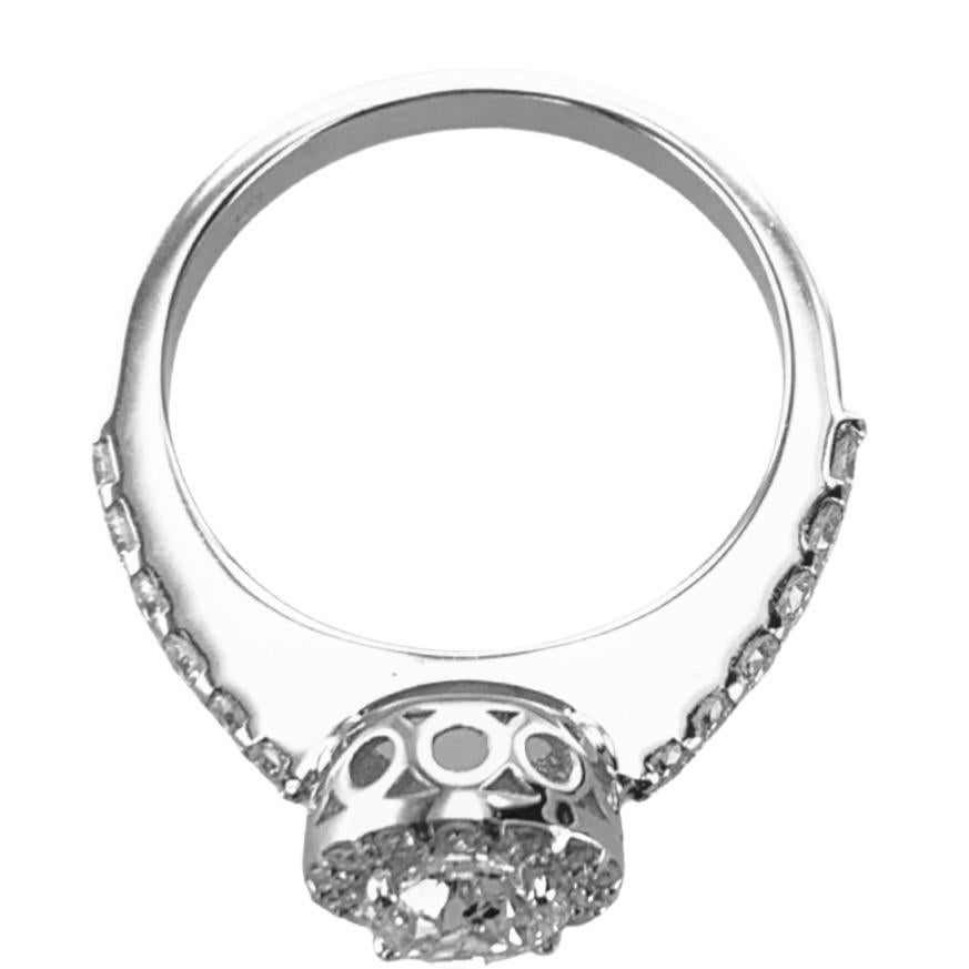 This 1.16 Carat Halo 18Kt White Gold Diamond cocktail ring, sparkles from every angle illuminating the finger. 

Wearable during the day or evening based on one's lifestyle, it is a stunning ring that adds glamour and style to any hand. 

The