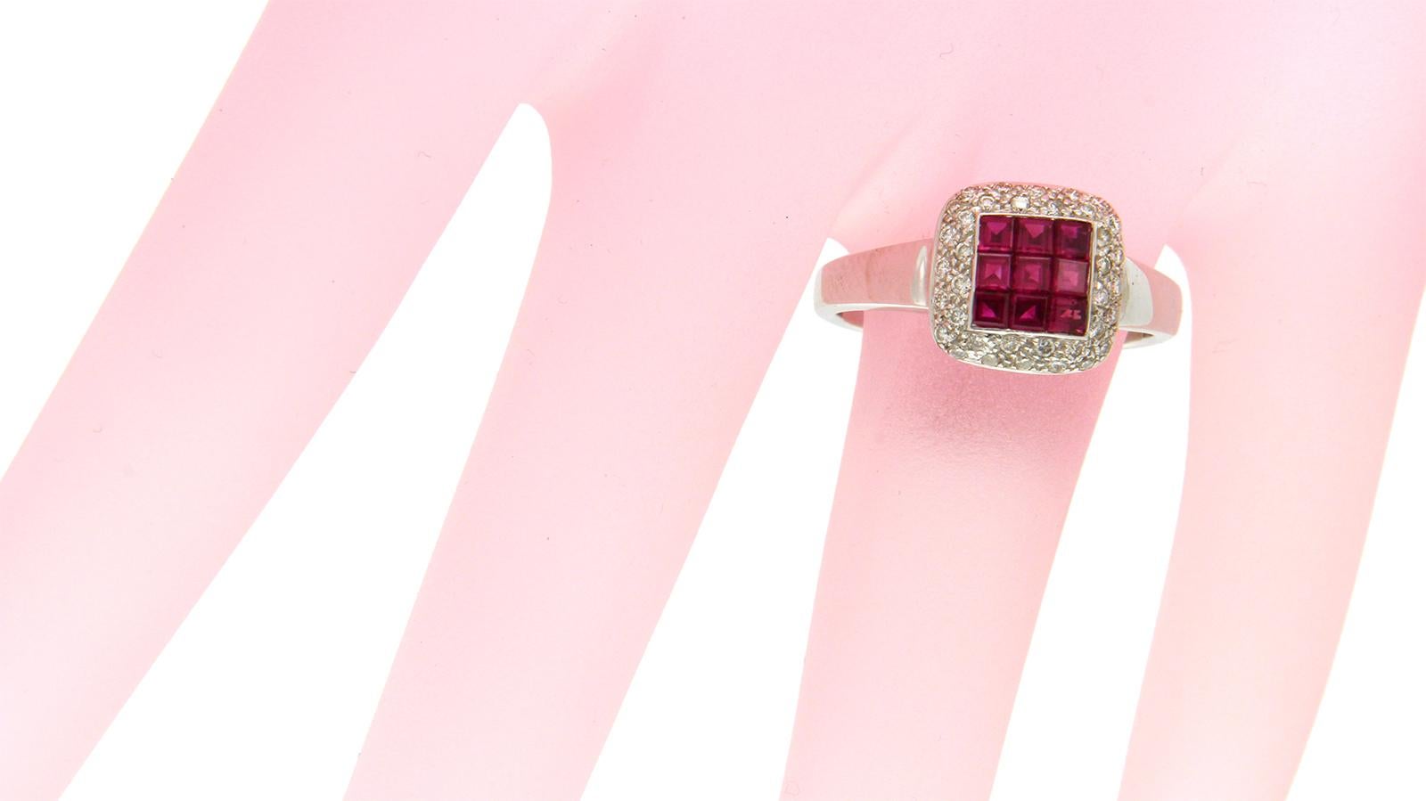 Type: Ring
Top:10 mm
Band Width: 2.7 mm
Metal: White Gold
Metal Purity: 18K
Size:6 to 9
Hallmarks: 18K
Total Weight: 4.4 Grams
Stone Type: 1.16 Natural Ruby and 0.32 Ct VS2 G Diamonds
Condition: New
Stock Number: BL12
..

Please Message Us for the