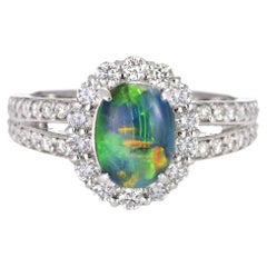 1.16 Carat Natural Australian Black Opal and Diamond Ring Made in Platinum