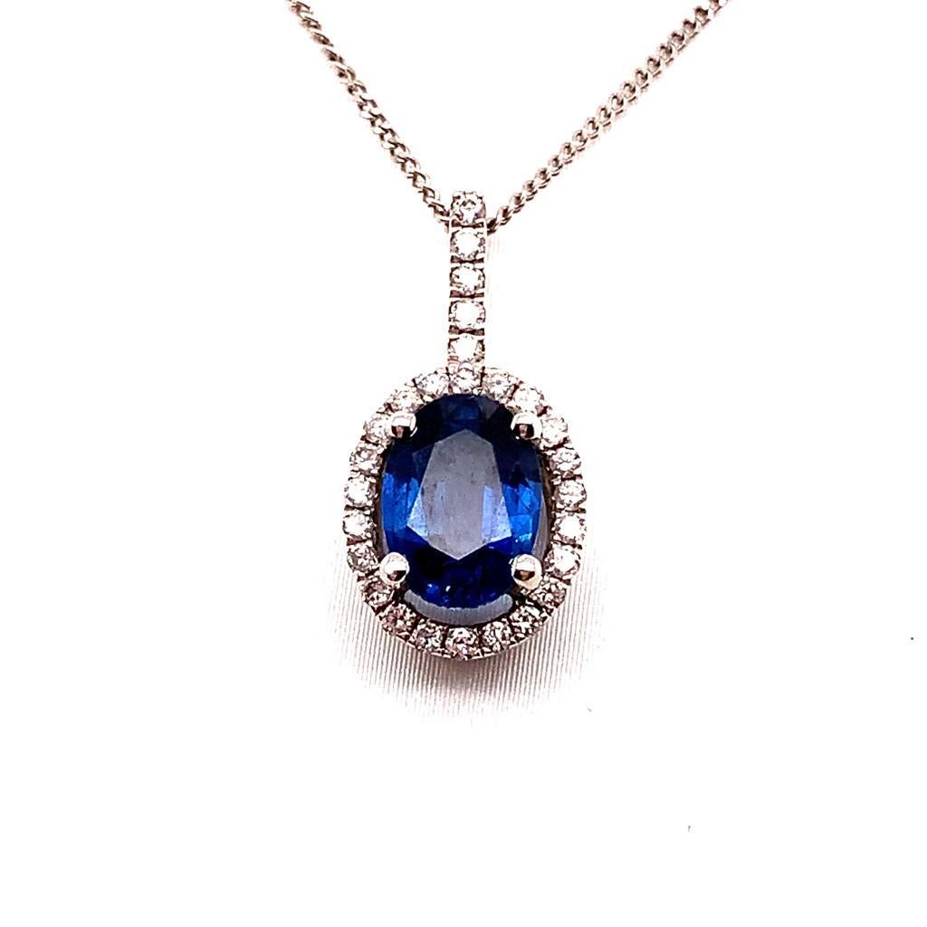 1.16 Carat Oval Brilliant Blue Sapphire and Diamond Pendant in 18K White Gold In New Condition For Sale In London, GB