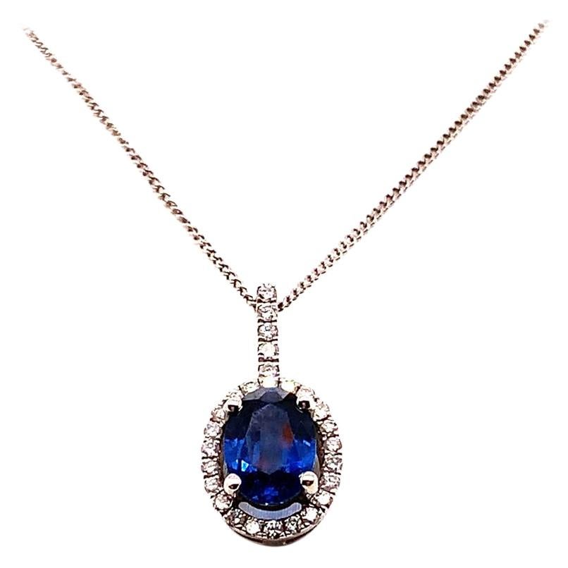 1.16 Carat Oval Brilliant Blue Sapphire and Diamond Pendant in 18K White Gold For Sale