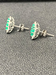 1.16 Carat Oval cut Emerald and Diamond Stud Earrings in 18K White Gold