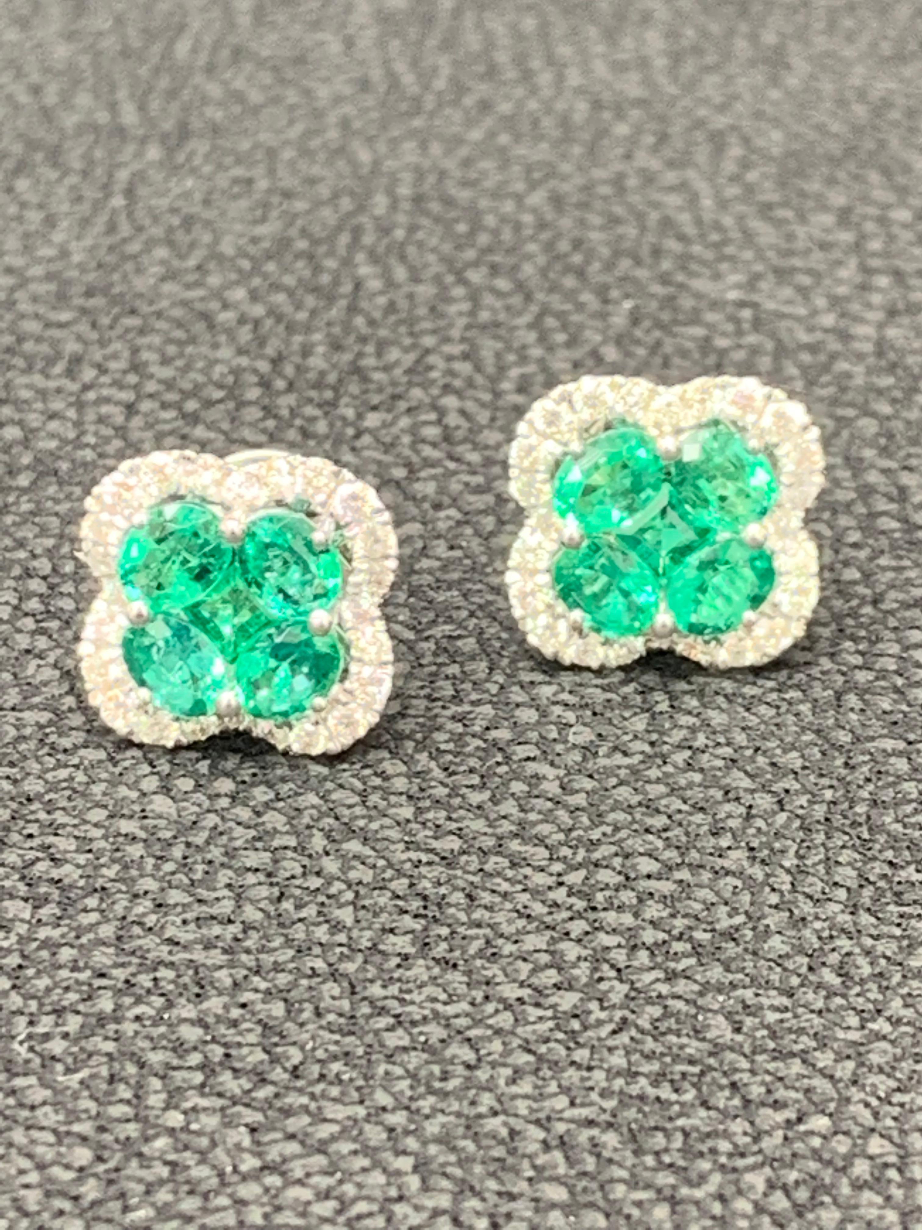 1.16 Carat Oval cut Emerald and Diamond Stud Earrings in 18K White Gold In New Condition For Sale In NEW YORK, NY