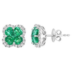 1.16 Carat Oval cut Emerald and Diamond Stud Earrings in 18K White Gold