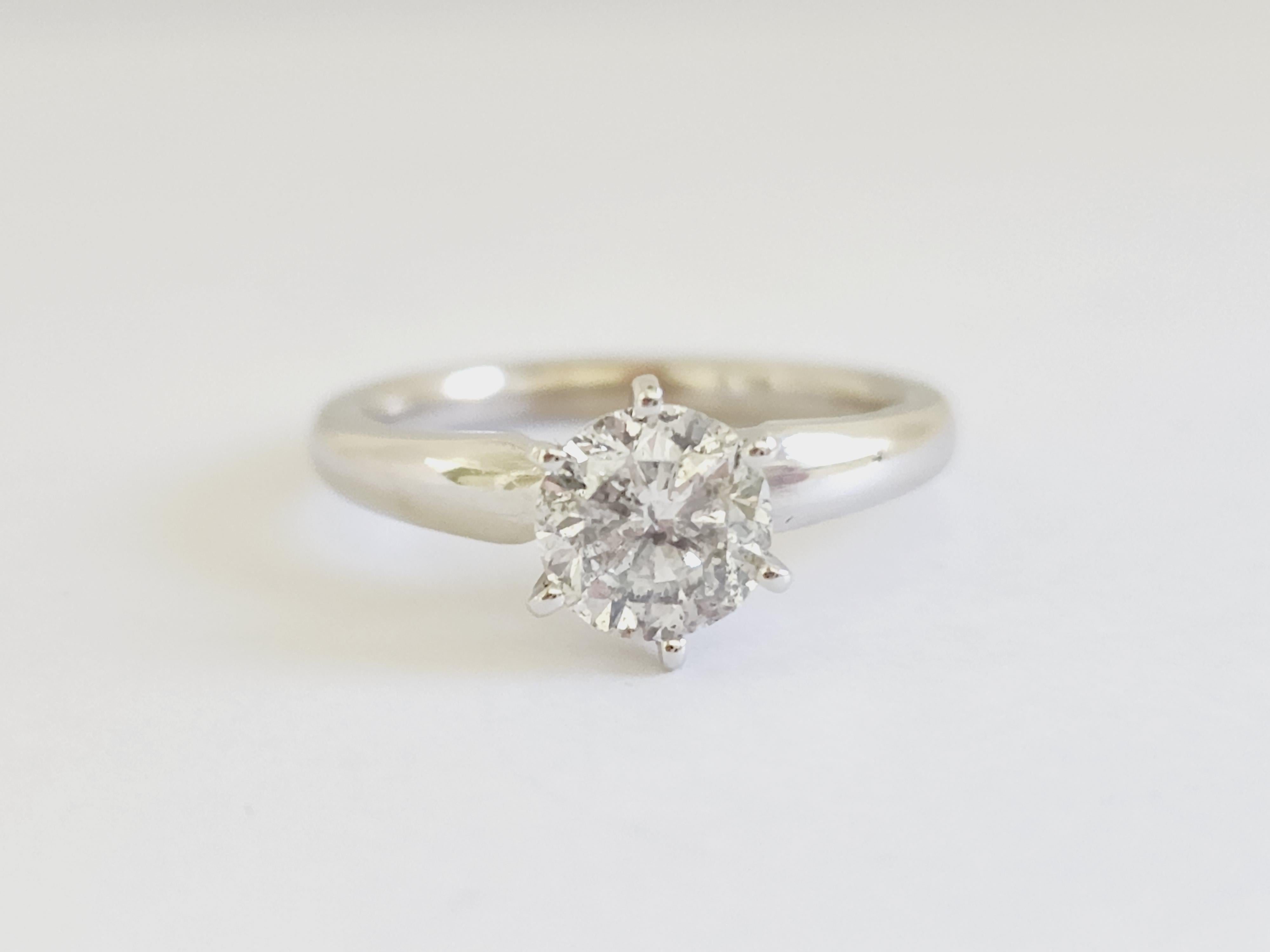 1.16 ct round brilliant cut natural diamonds. 6 prong solitaire setting, set in 14k white gold. Ring Size 6.5.