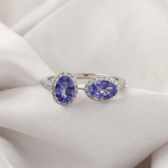 1.16 Carat Tanzanite Gemstone 0.30 Carat SI/H Diamond Ring 18 Karat White Gold