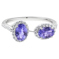 1.16 Carat Tanzanite Gemstone 0.30 Carat SI/H Diamond Ring 18 Karat White Gold