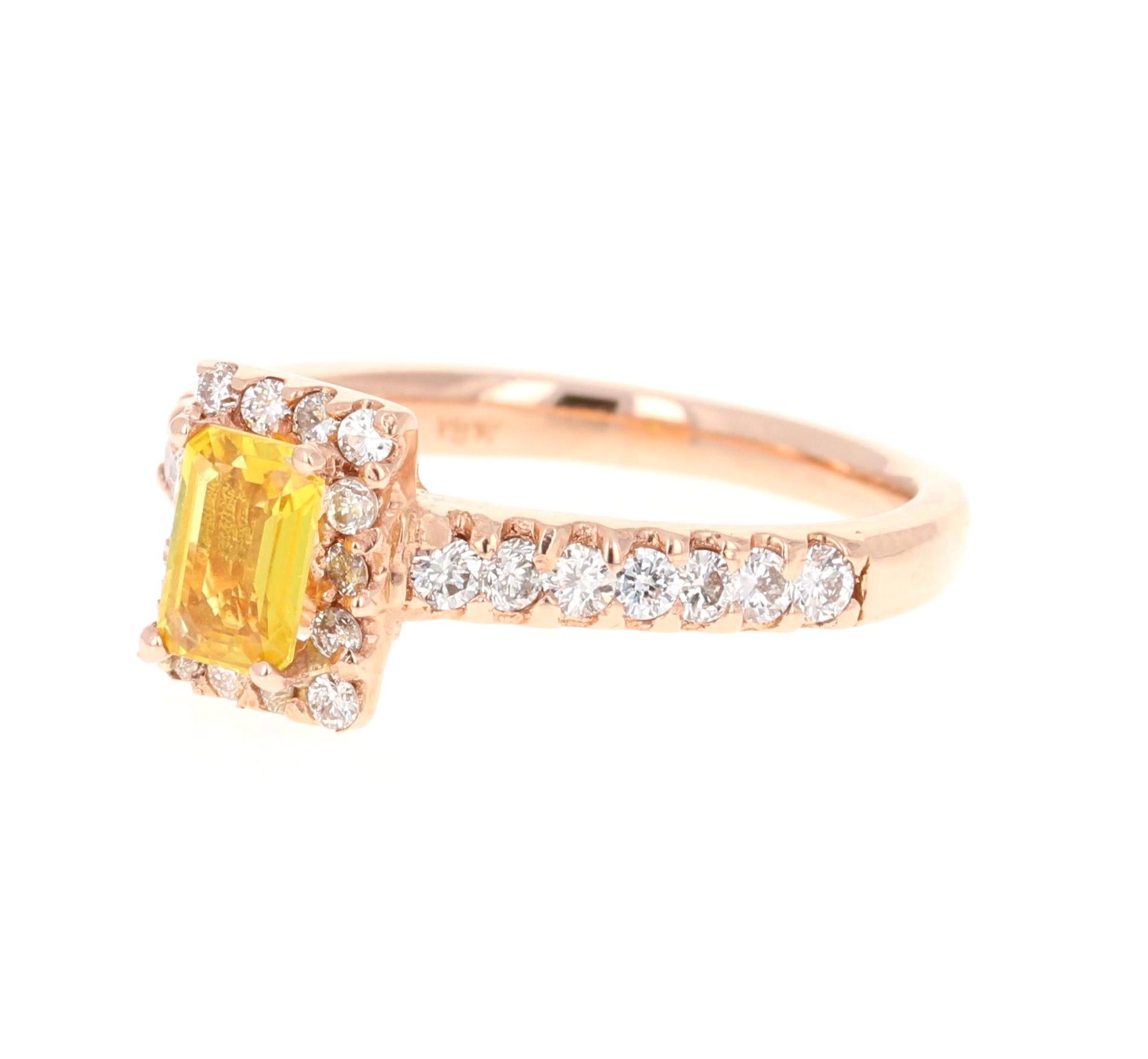 This ring has a Emerald Cut Yellow Sapphire that weighs 0.62 Carats and is surrounded by 28 Round Cut Diamonds that weigh 0.54 Carats. The Total Carat Weight of the ring is 1.16 Carats. 

The ring is set in a cute 18 Karat Rose Gold setting, with an