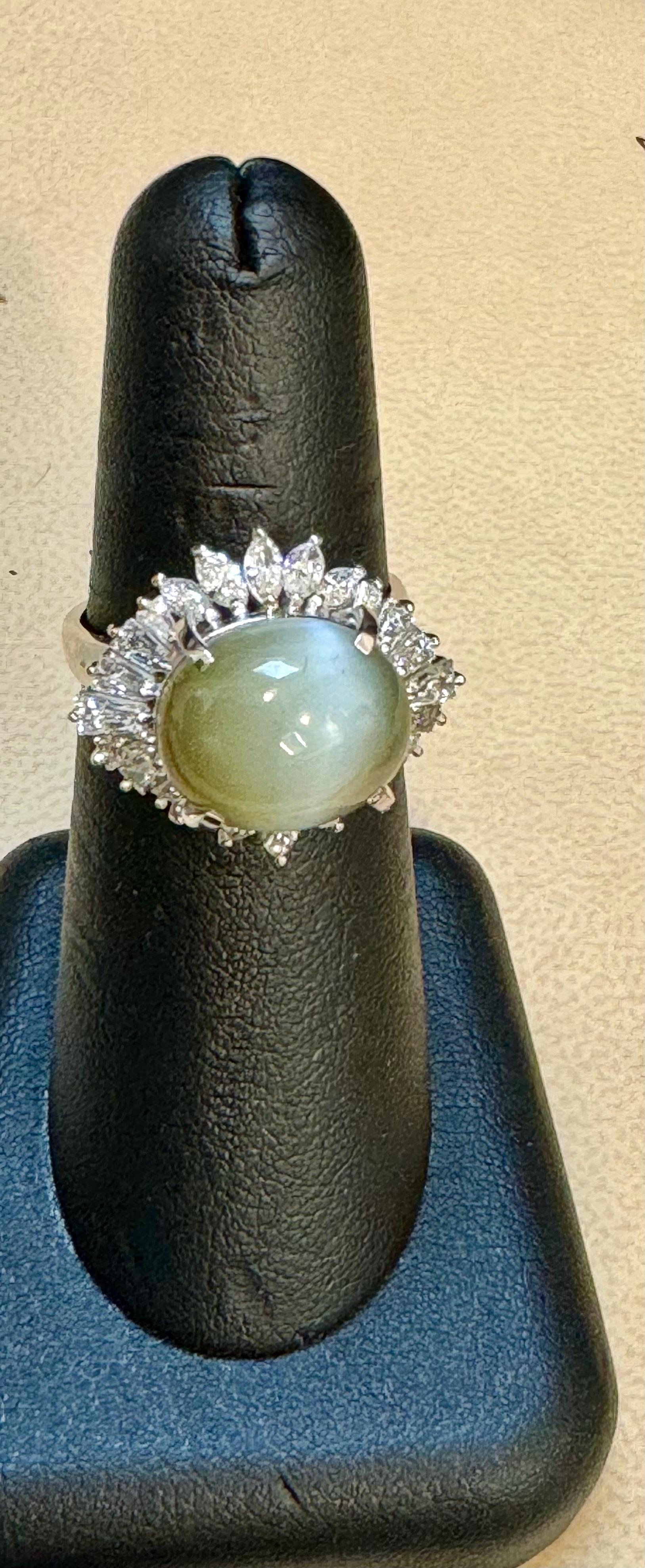11.6 Ct Chrysoberyl Cats Eye Unisex Ring With Marquise  Diamond Set in platinum In Excellent Condition For Sale In New York, NY