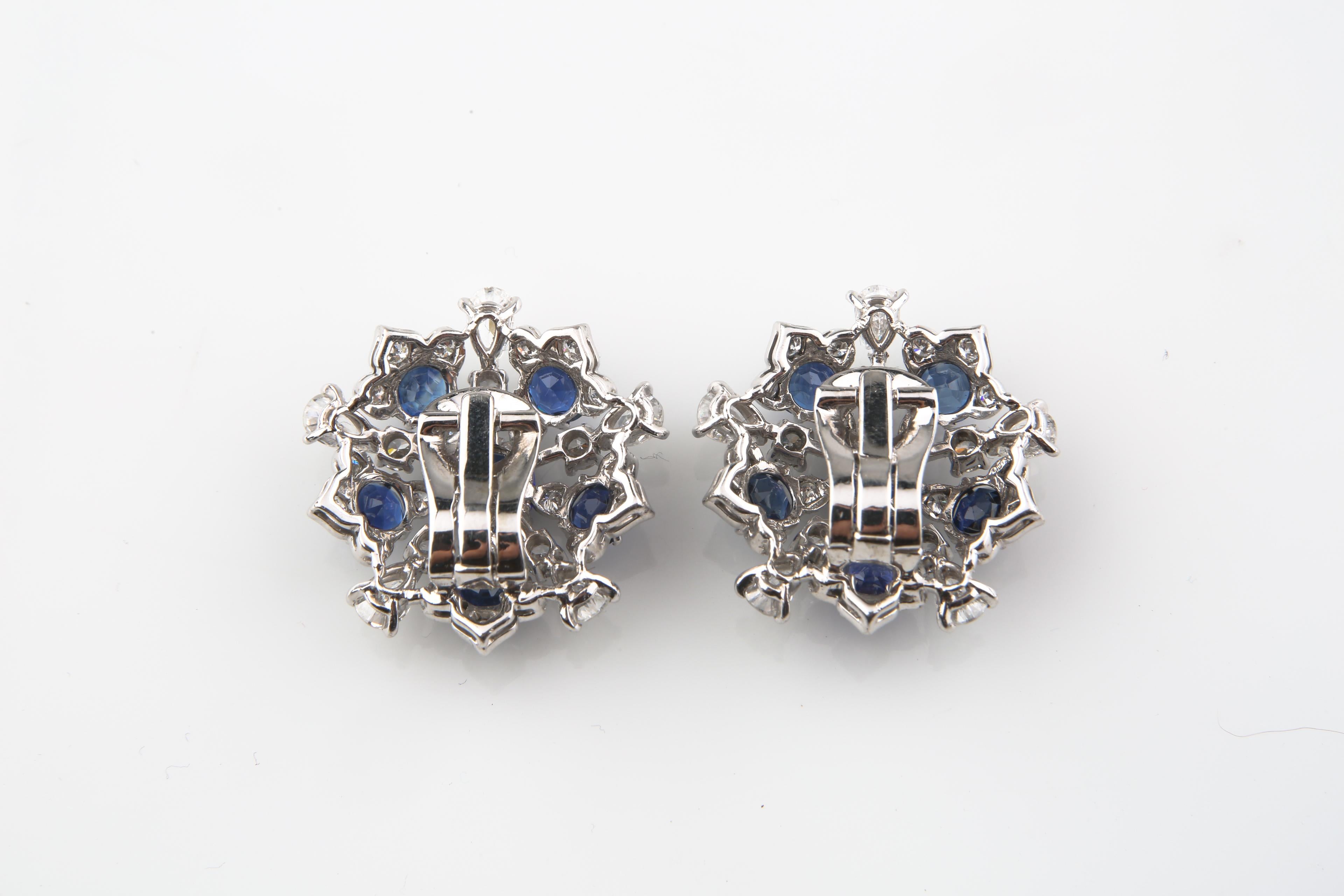 One pair 18KT white gold ladies custom assembled sapphire and diamond earrings with french clip backs.
Condition is very good.
Contain:

Two prong set square cushion mixed cut natural blue sapphire
Measure 7.00 x 6.70 x 3.75 mm
Approximate total