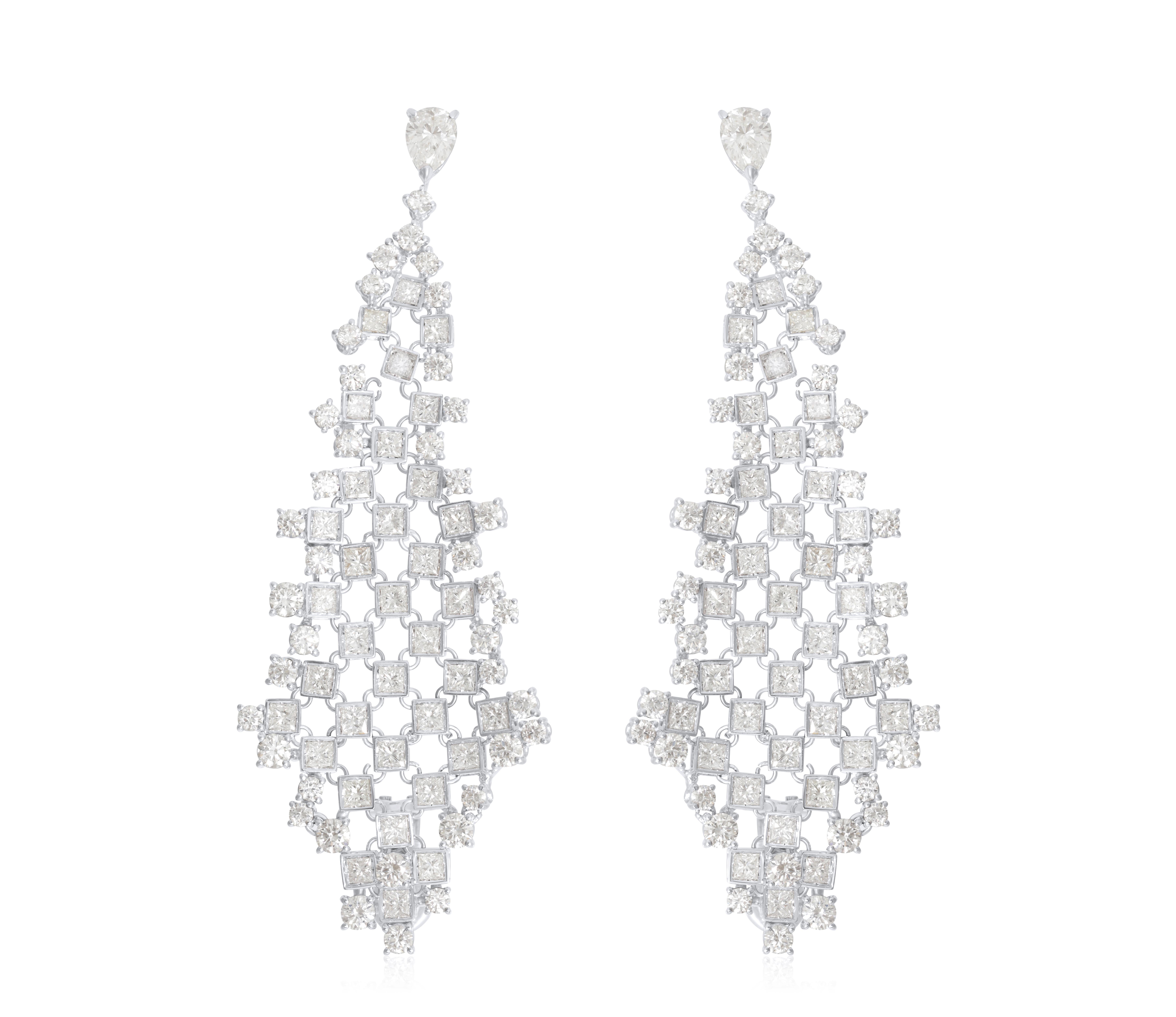 18K White Gold Diamond Chandelier and Diamond Earring features 11.60 carats of multi shaped diamonds. 
