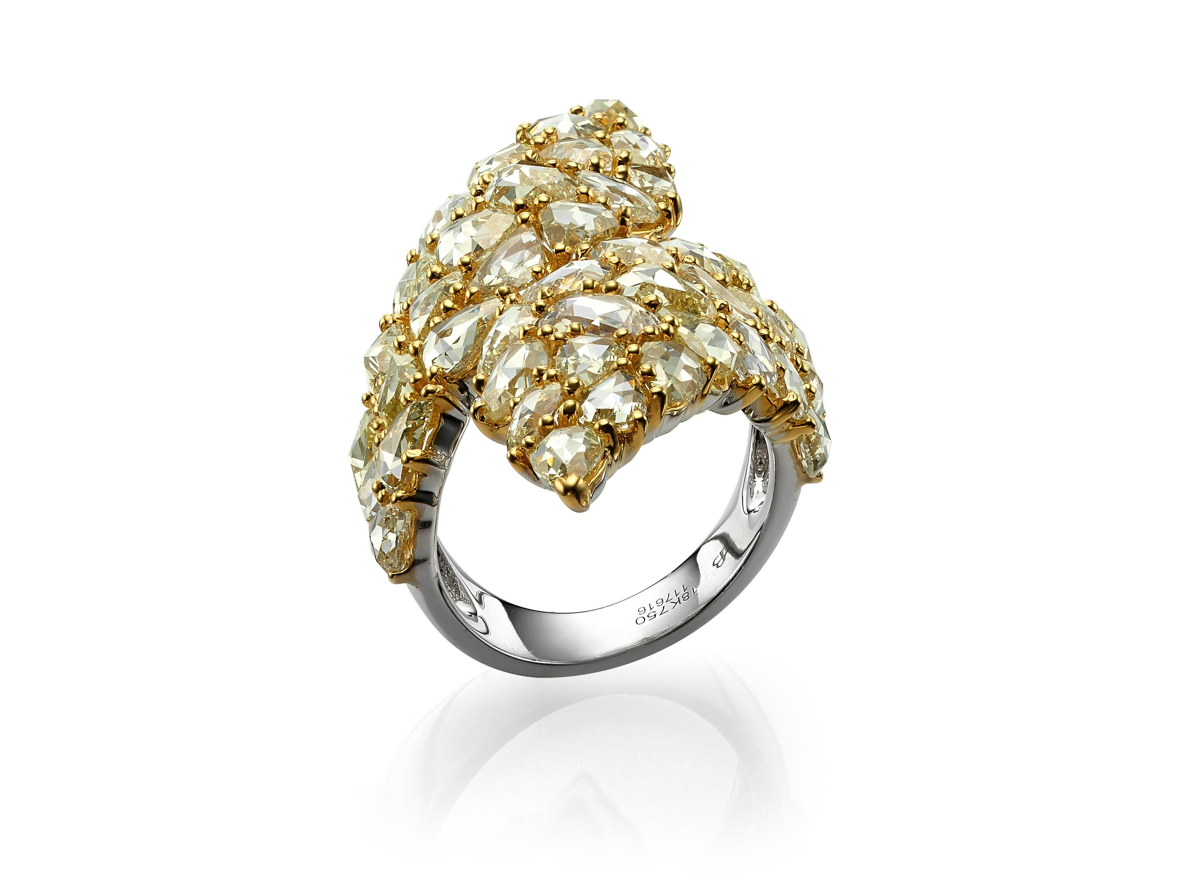 A dramatic cluster of rose cut yellow diamonds set in a 18K yellow gold ring.  Total diamond weight 11.62 carats.  Wear it with the Butani 29.40 Carat Rose Cut Yellow Diamond 18 Karat Yellow Gold Earrings.
Currently a ring size US 7.  For other