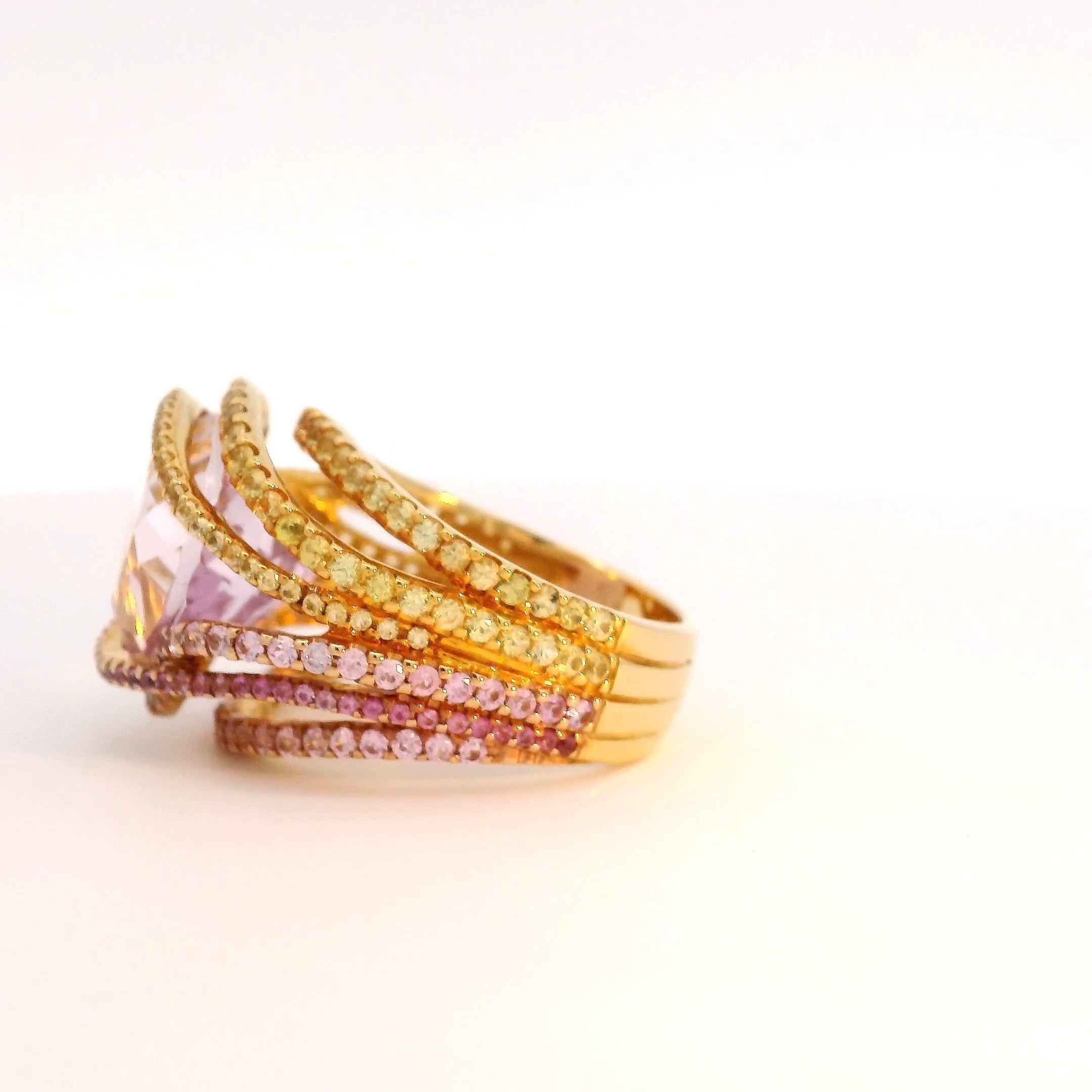 Contemporary 11.63 Carat Kunzite Ring surrounded by Pink and Yellow Sapphire Strands