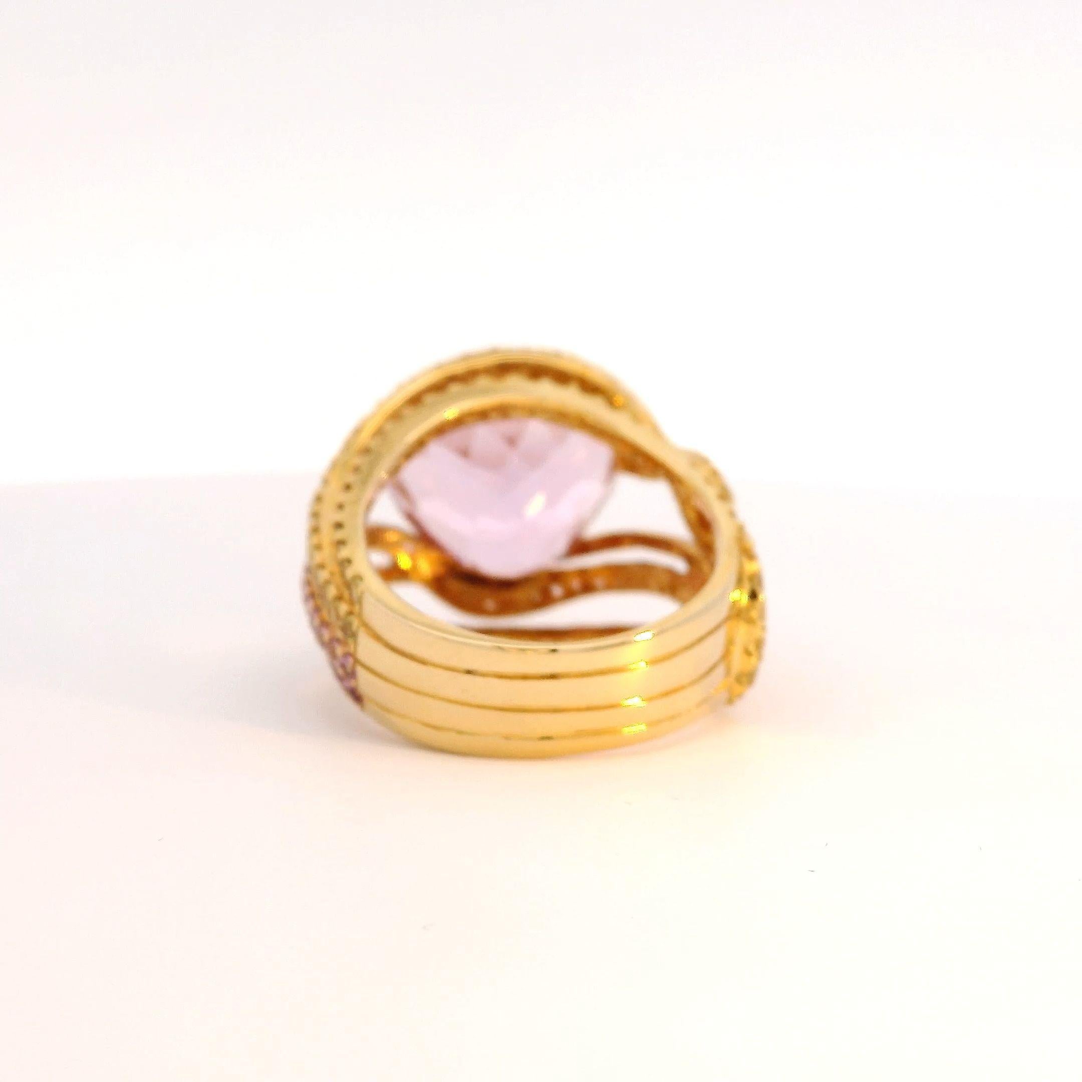 Trillion Cut 11.63 Carat Kunzite Ring surrounded by Pink and Yellow Sapphire Strands