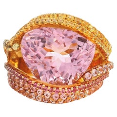 11.63 Carat Kunzite Ring surrounded by Pink and Yellow Sapphire Strands