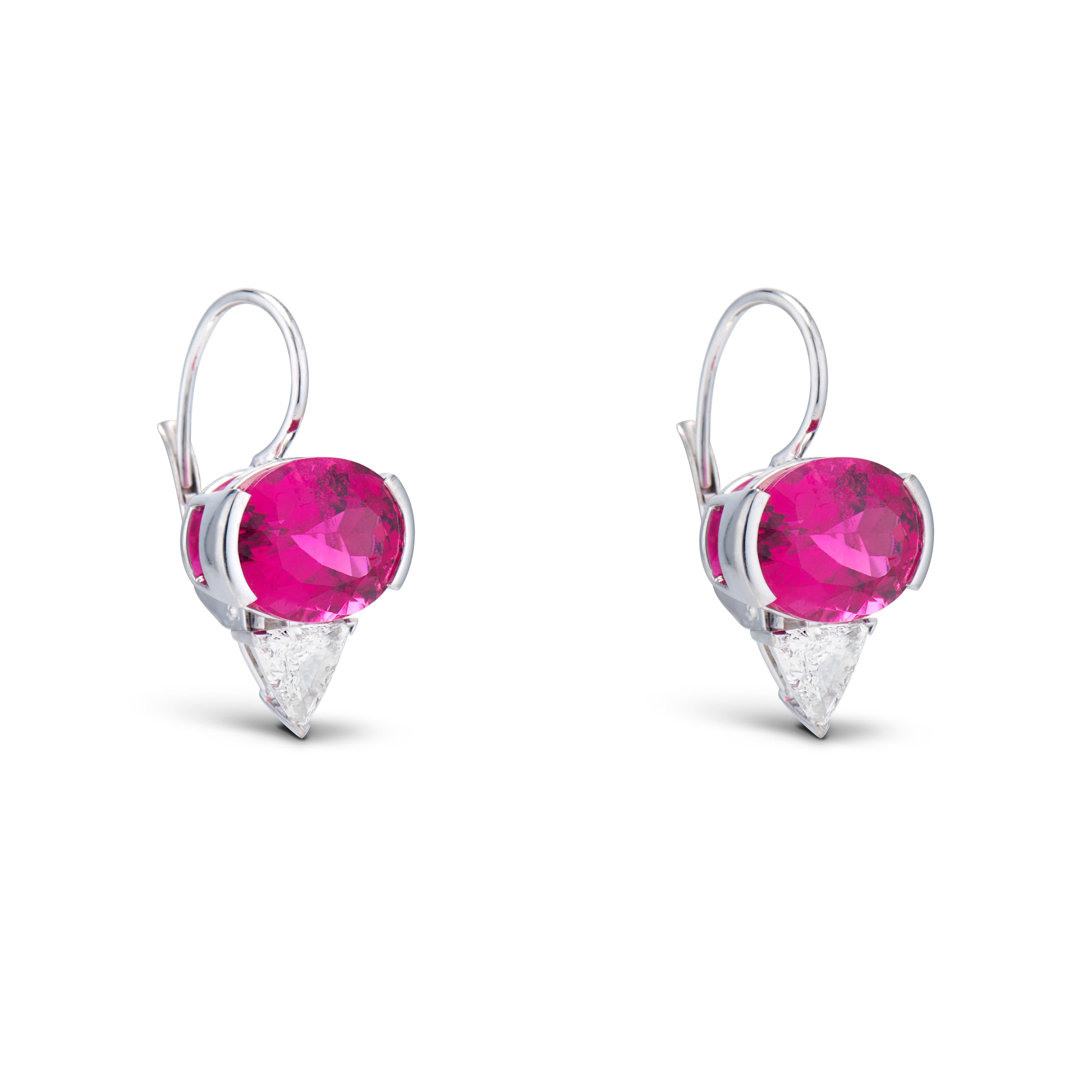 From the Passion & Strength collection, the Victoria Earrings are set with oval-shaped rubellite tourmalines total weighing 11.65 carats paired with striking, 1.22 carats E VS angular trillion-cut diamonds.
Handcrafted in 18k white gold.
The earring