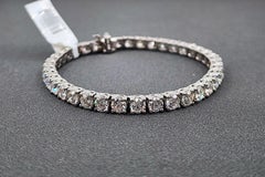 Bracelet « tennis » en diamants de 11.68 carats, monté sur platine