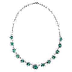 Collana con smeraldo dello Zambia da 11,68 ct e diamanti a corona da 7,91 ct in oro bianco 18 carati