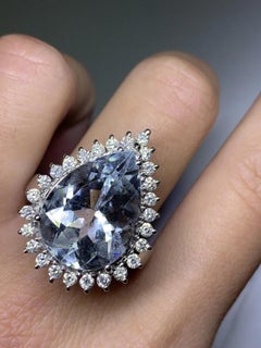 11.68ct Aquamarine Pear shape and diamonds engagement cocktail ring in 18k gold.