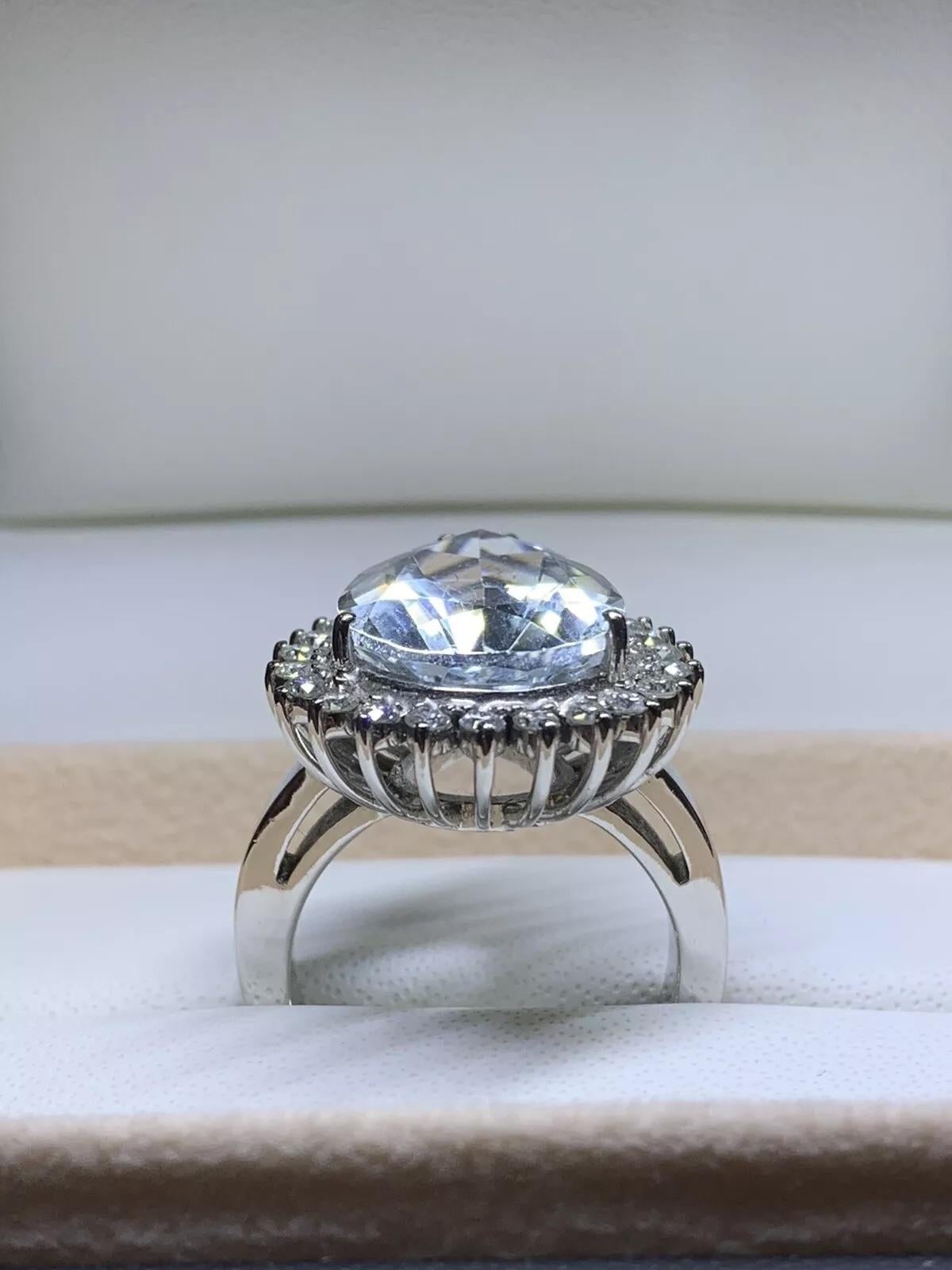 Pear Cut 11.68ct Aquamarine Pear shape and diamonds engagement cocktail ring in 18k gold. For Sale