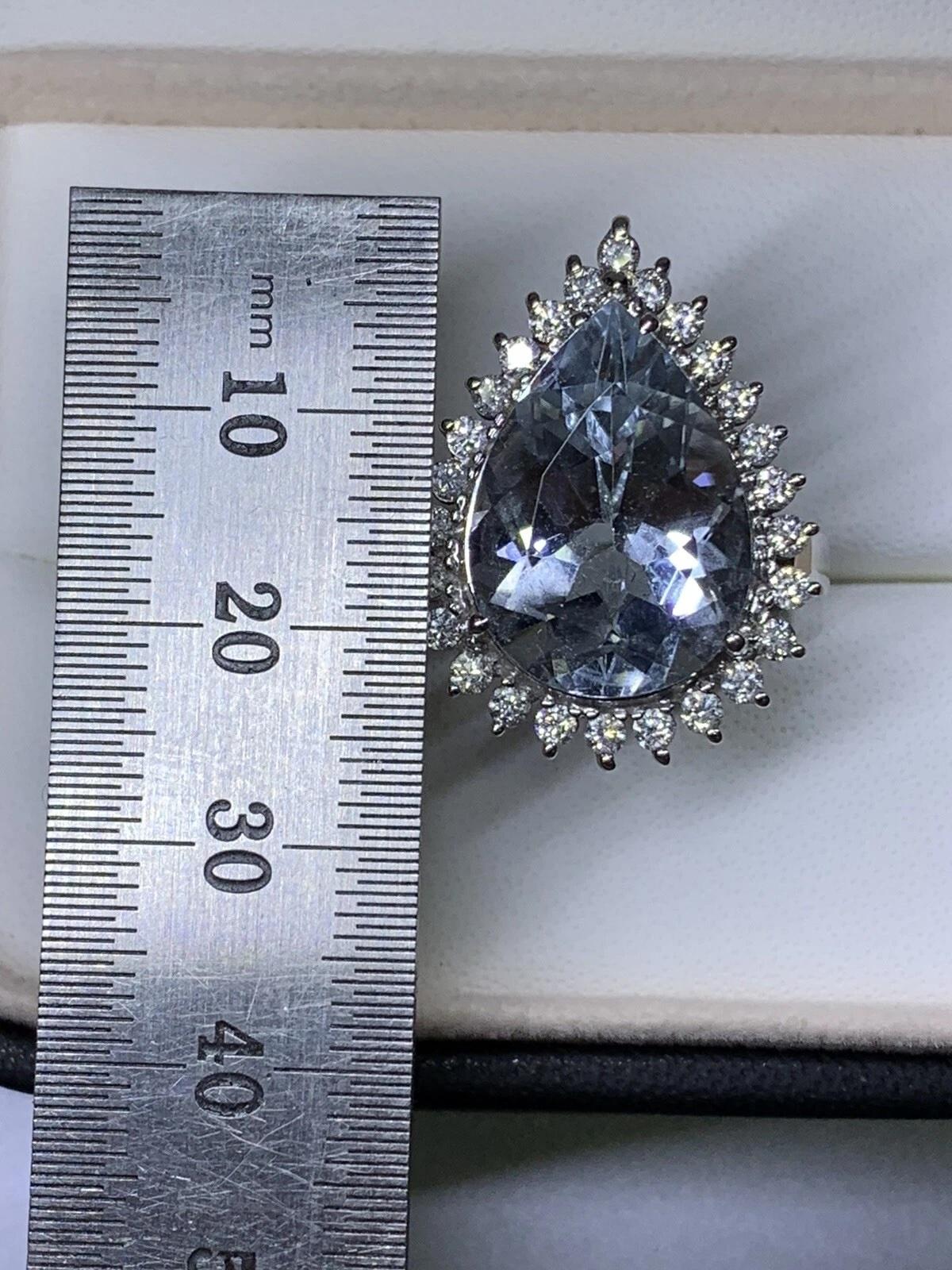 11.68ct Aquamarine Pear shape and diamonds engagement cocktail ring in 18k gold. For Sale 1
