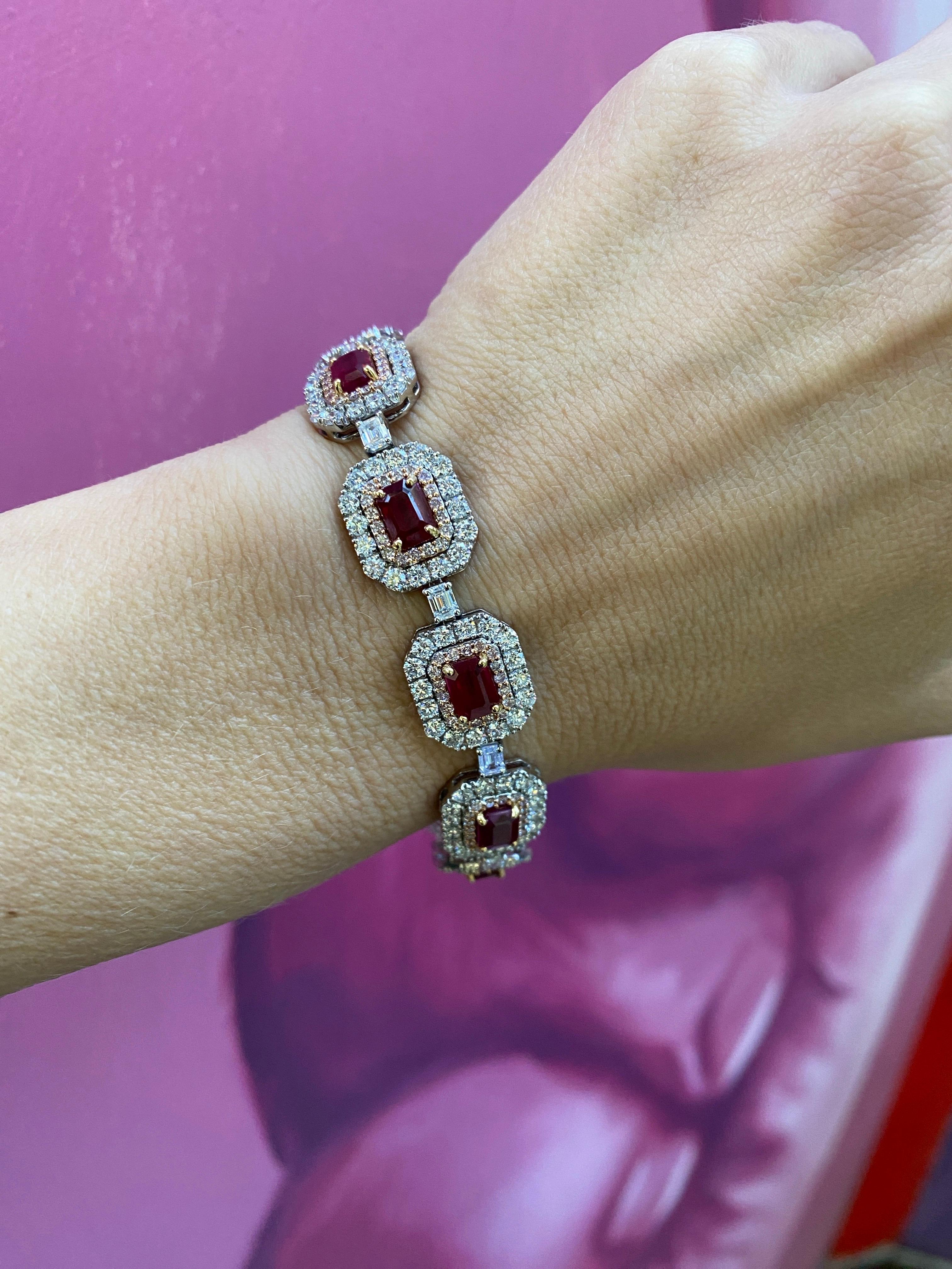 11.69ctw Emerald Cut Rubies and Diamond Link Bracelet, 18 Karat Gold For Sale 6